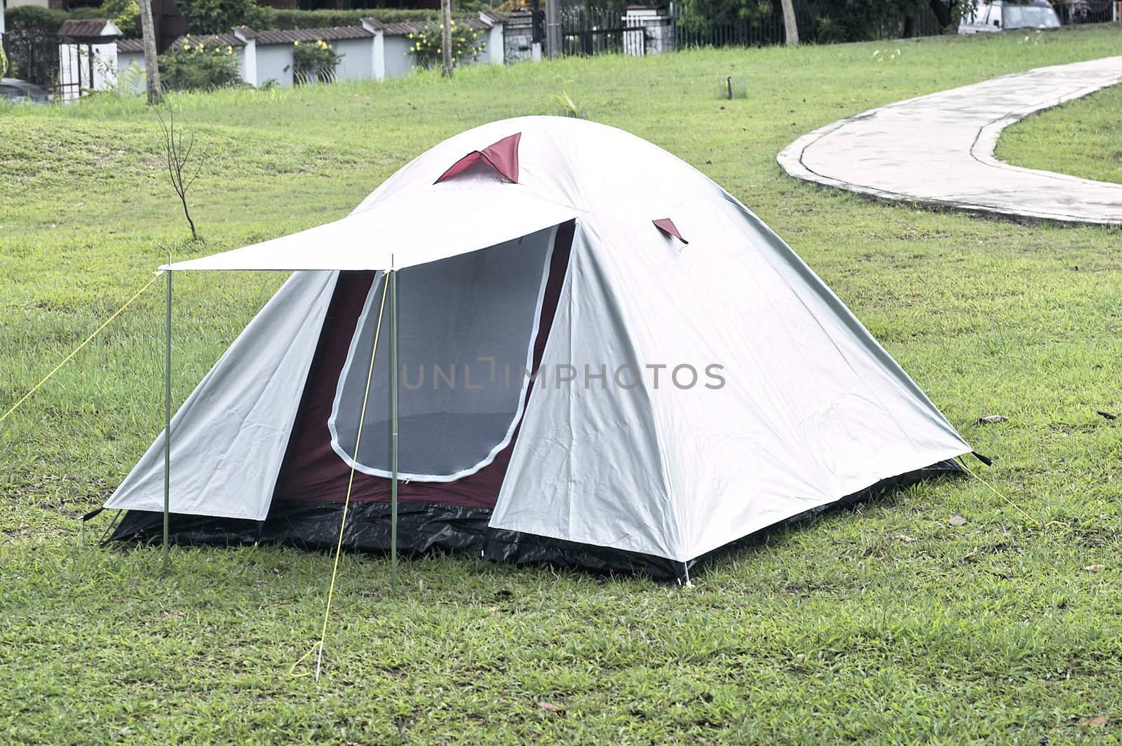 Camping tent on camping site.
