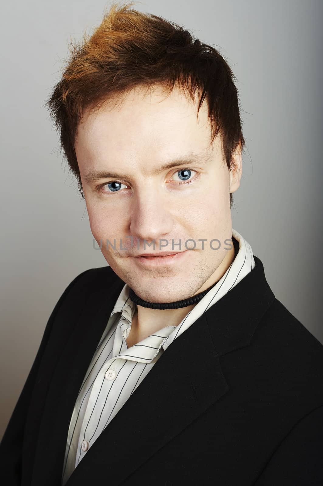 Portrait of young smiling businessman 