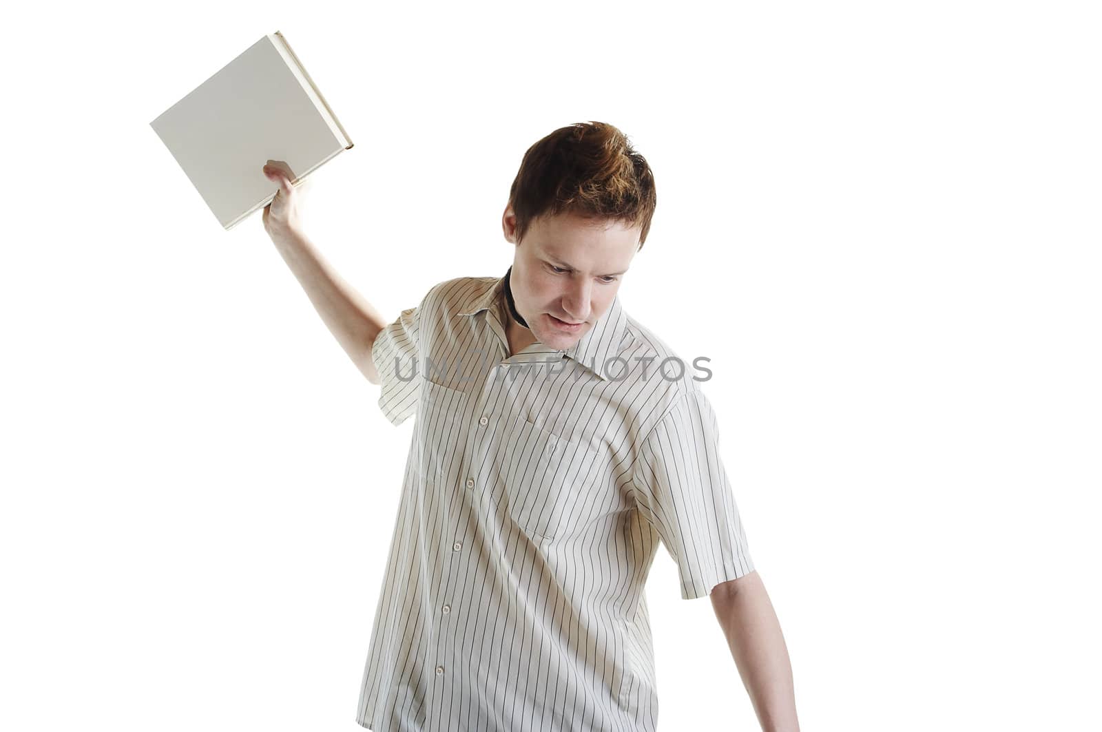 Angry student throwing book on the floor