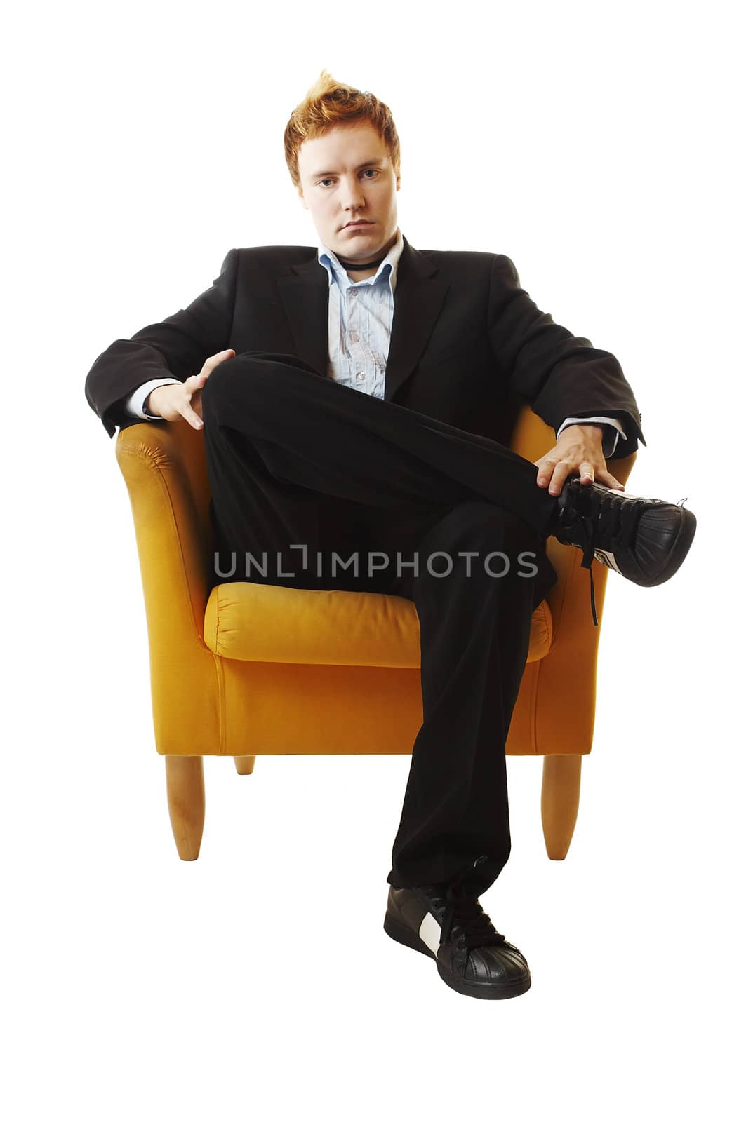 Business man sitting in the couch