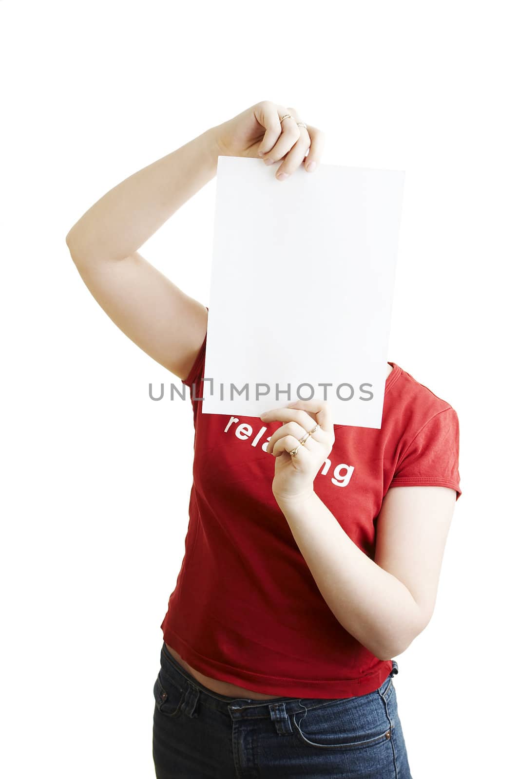 Girl holding empty note behind her face
