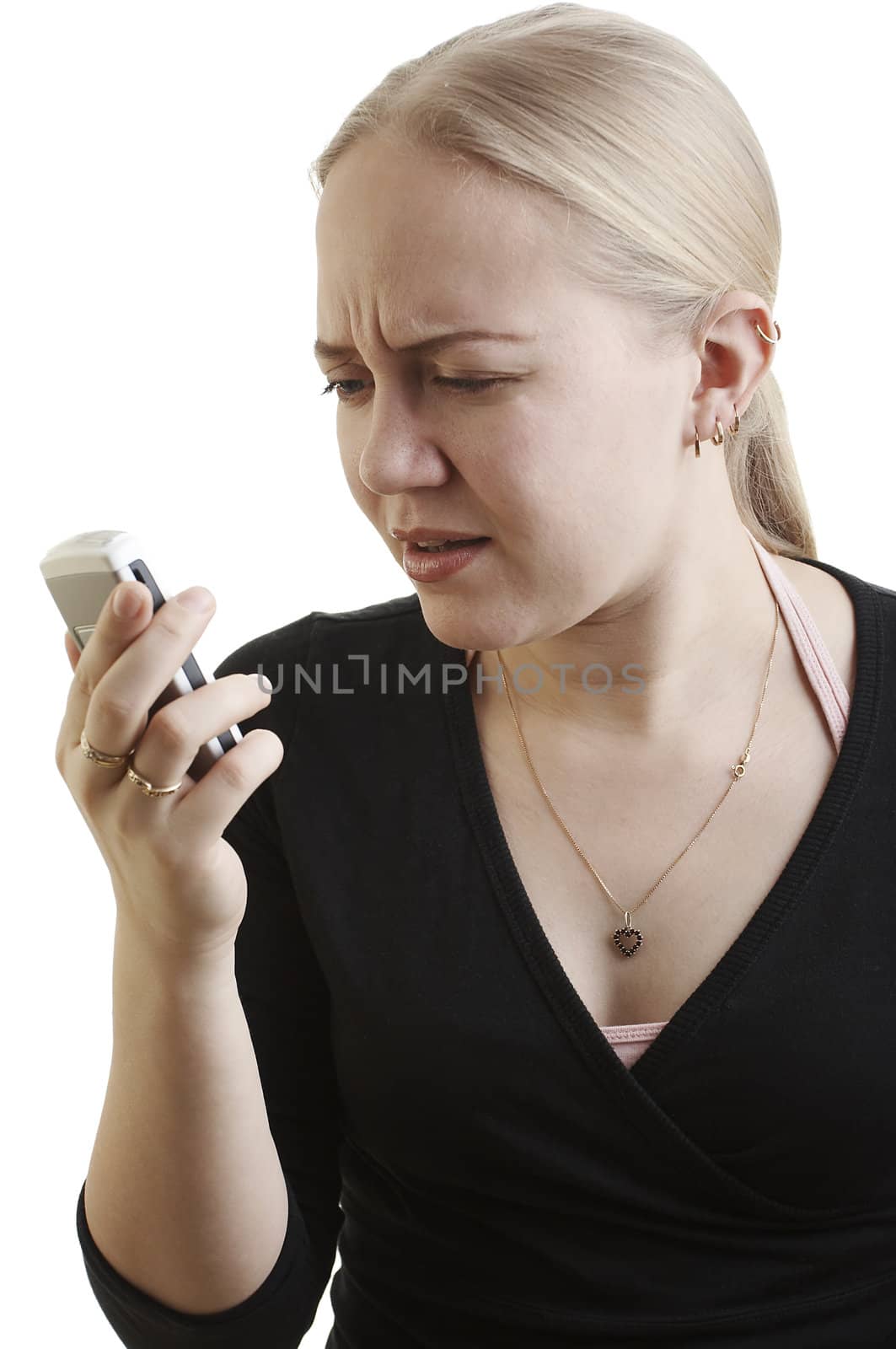 Woman reading a text message on the white background