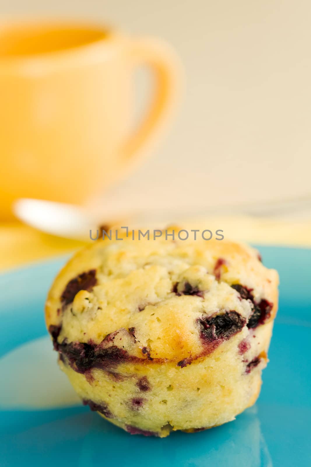 Breakfast muffin with cup of coffee
