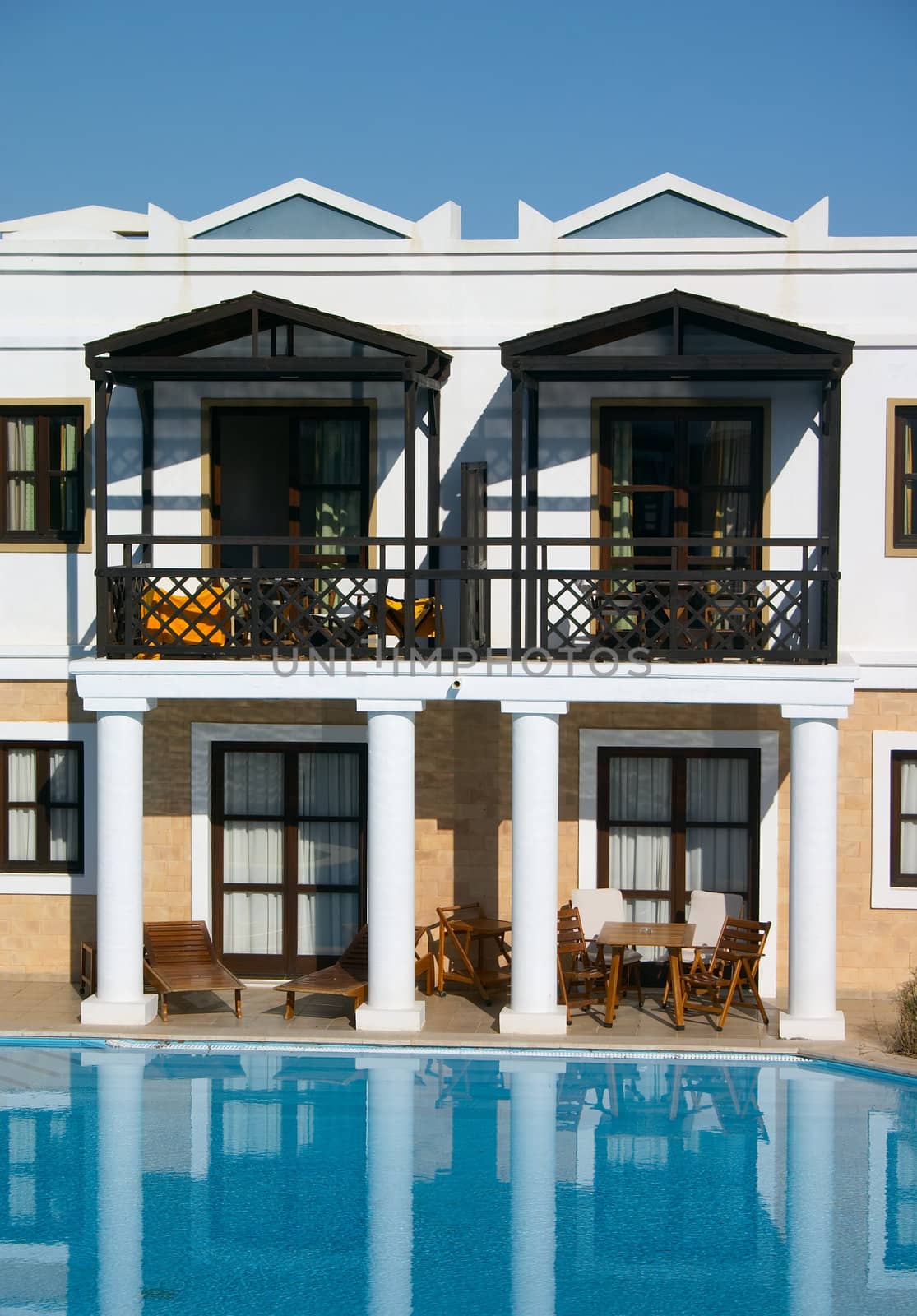 villa and swimming pool in resort
