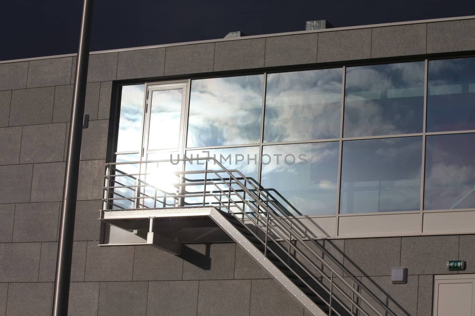 the afternoon sun reflecting in a modern office building