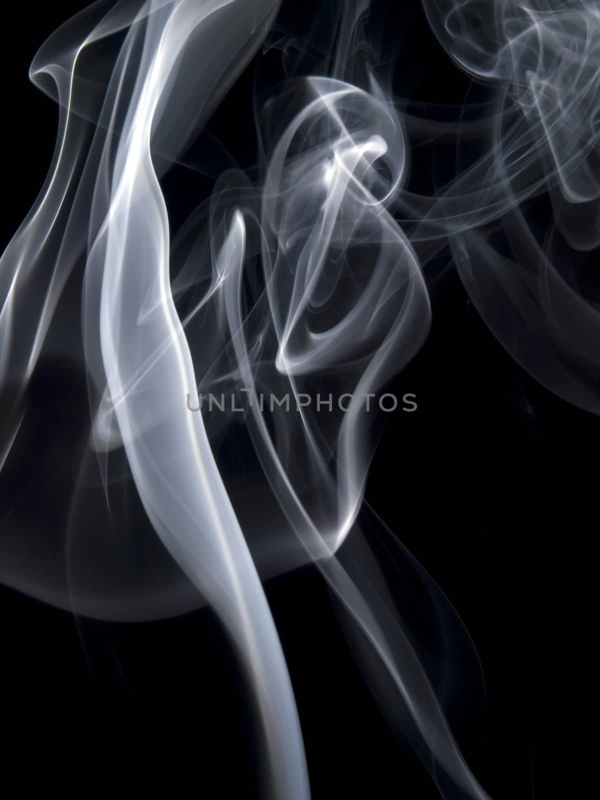 Abstract image of smoke trails frozen with off camera flash