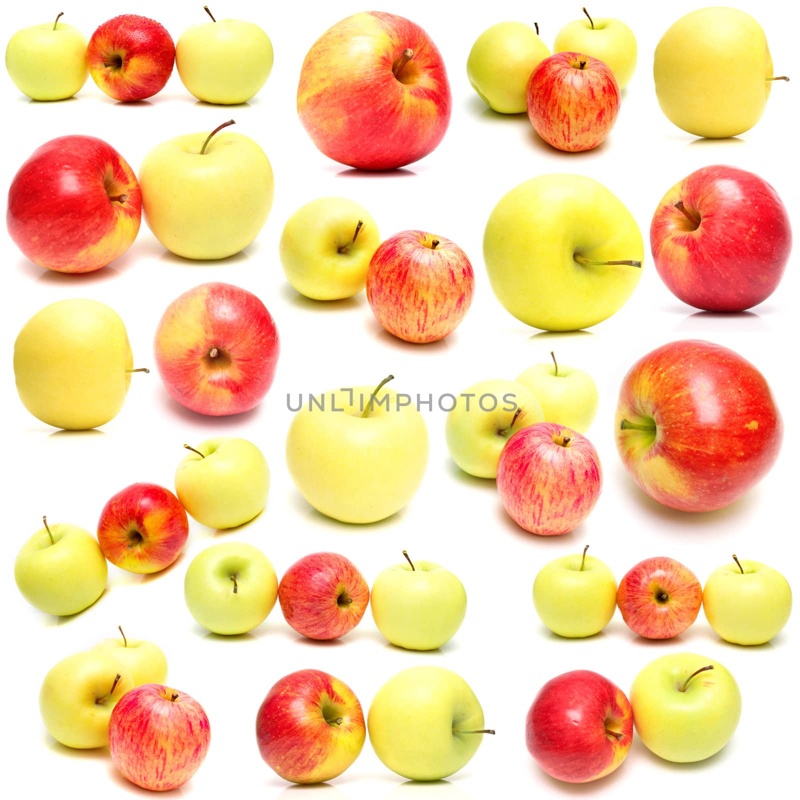 red and yellow apples on white background. Isolation. Shallow DOF.
