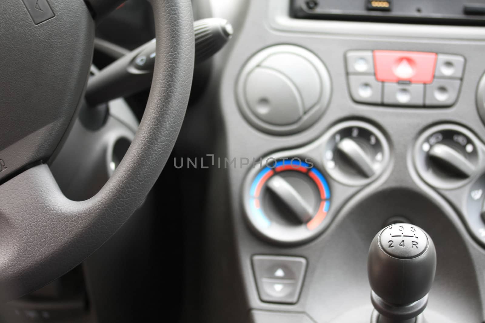 detail of a car interior, stick shift car