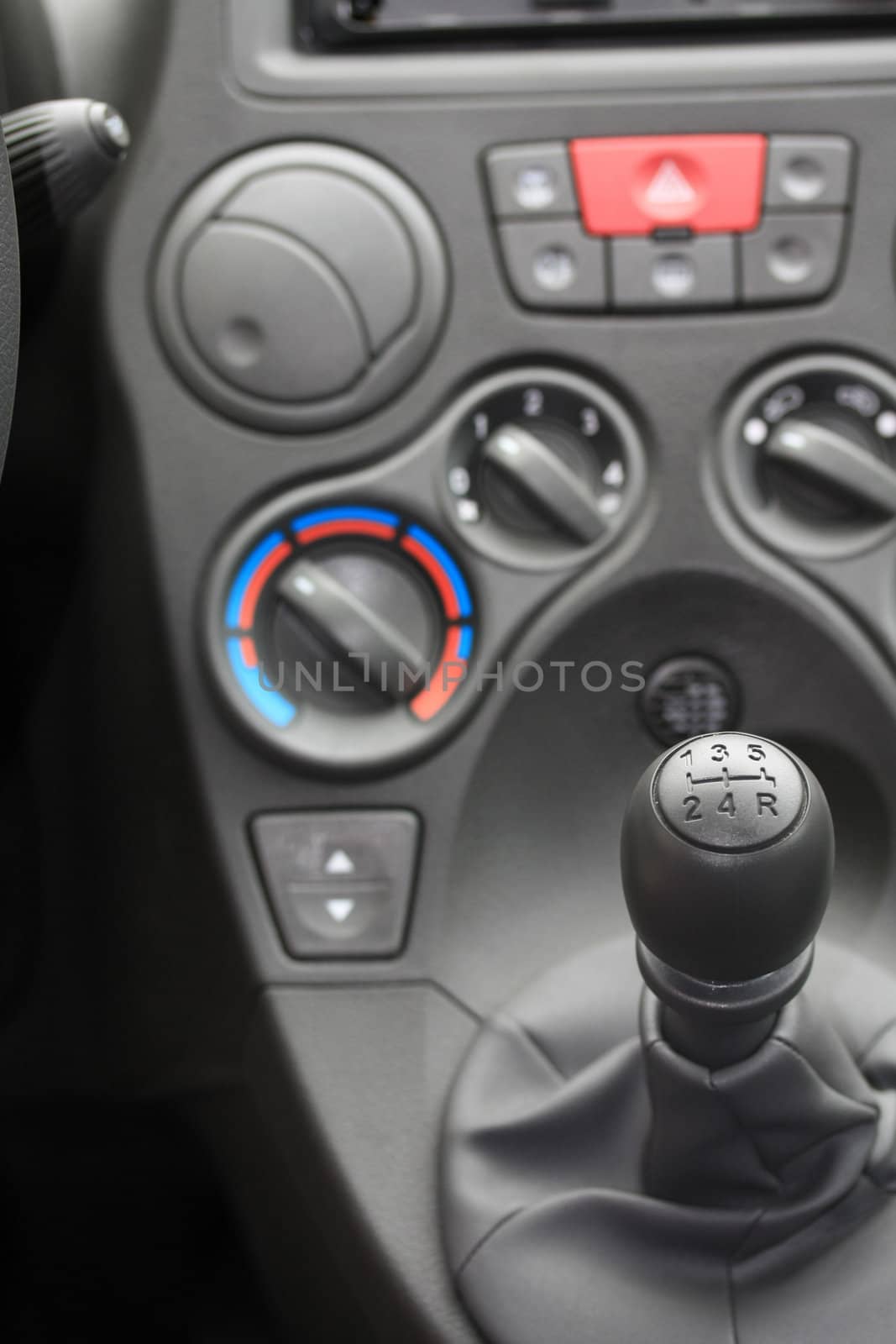 detail of a car interior, stick shift car