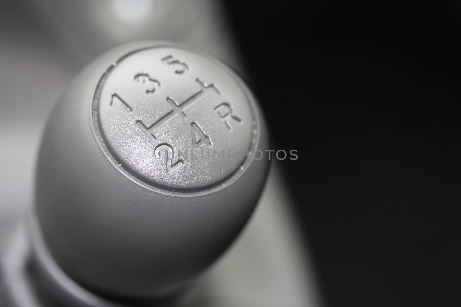 detail of a car interior, stick shift car