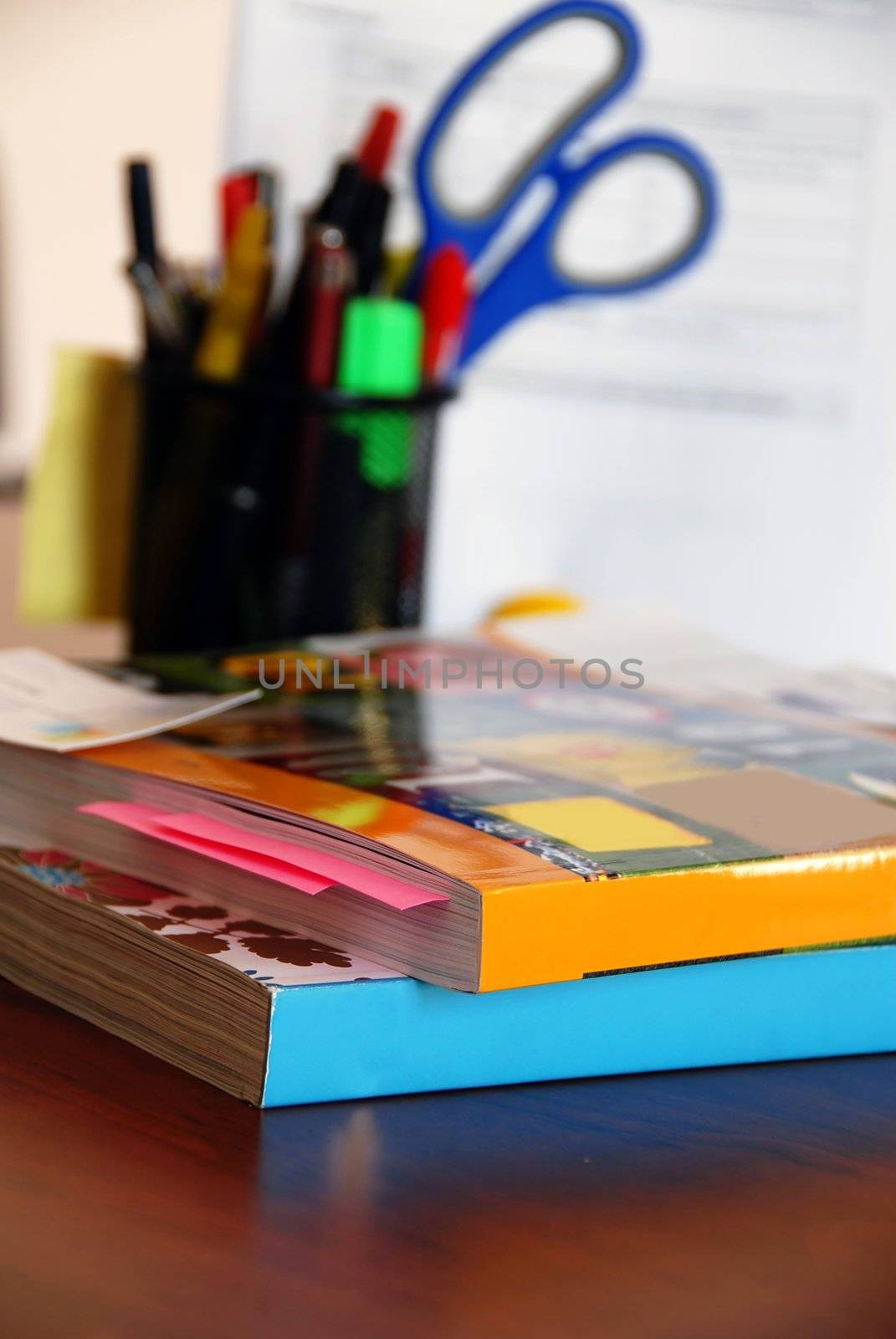 Catalogs on office desk by simply