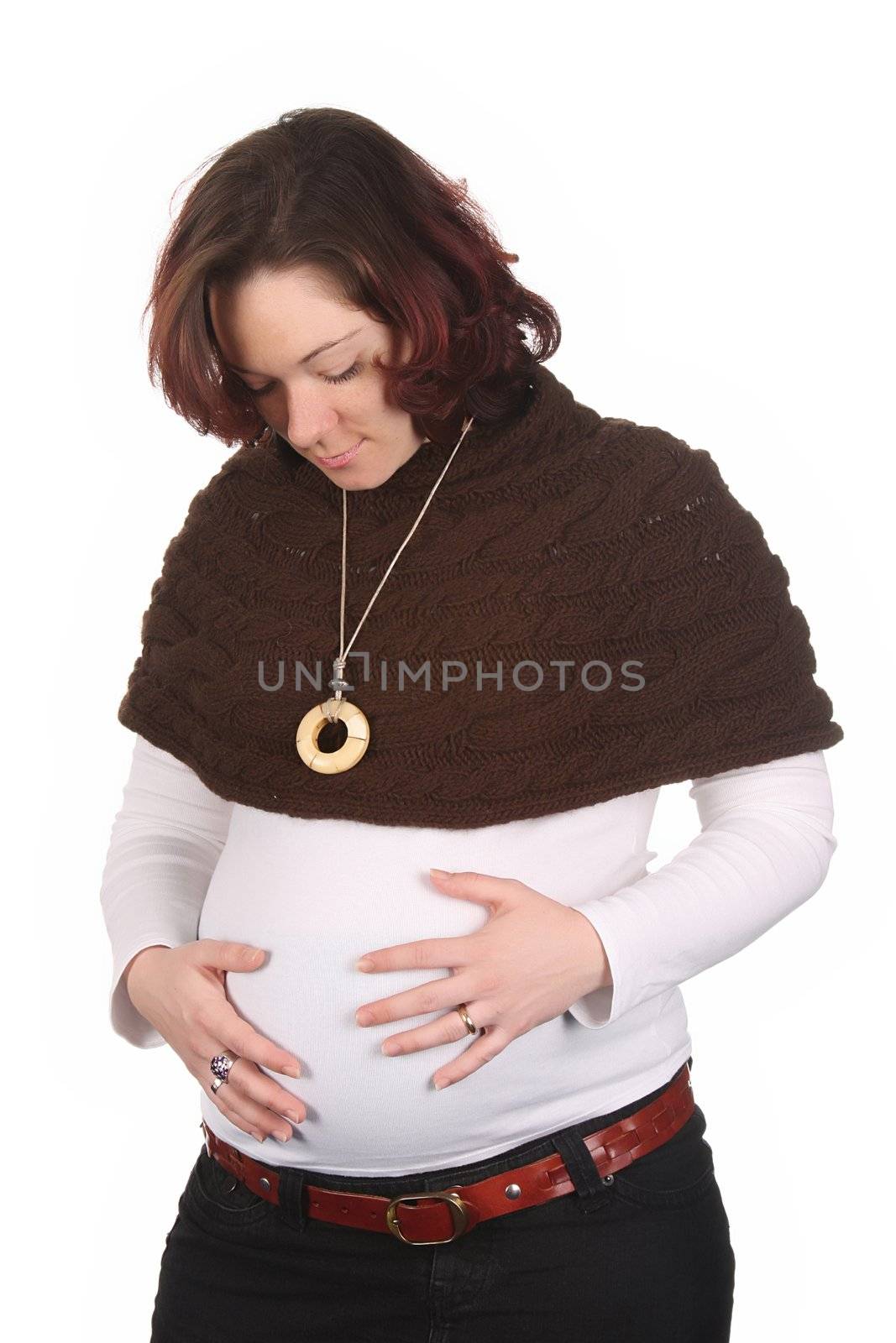 pregnant woman holding belly on white background