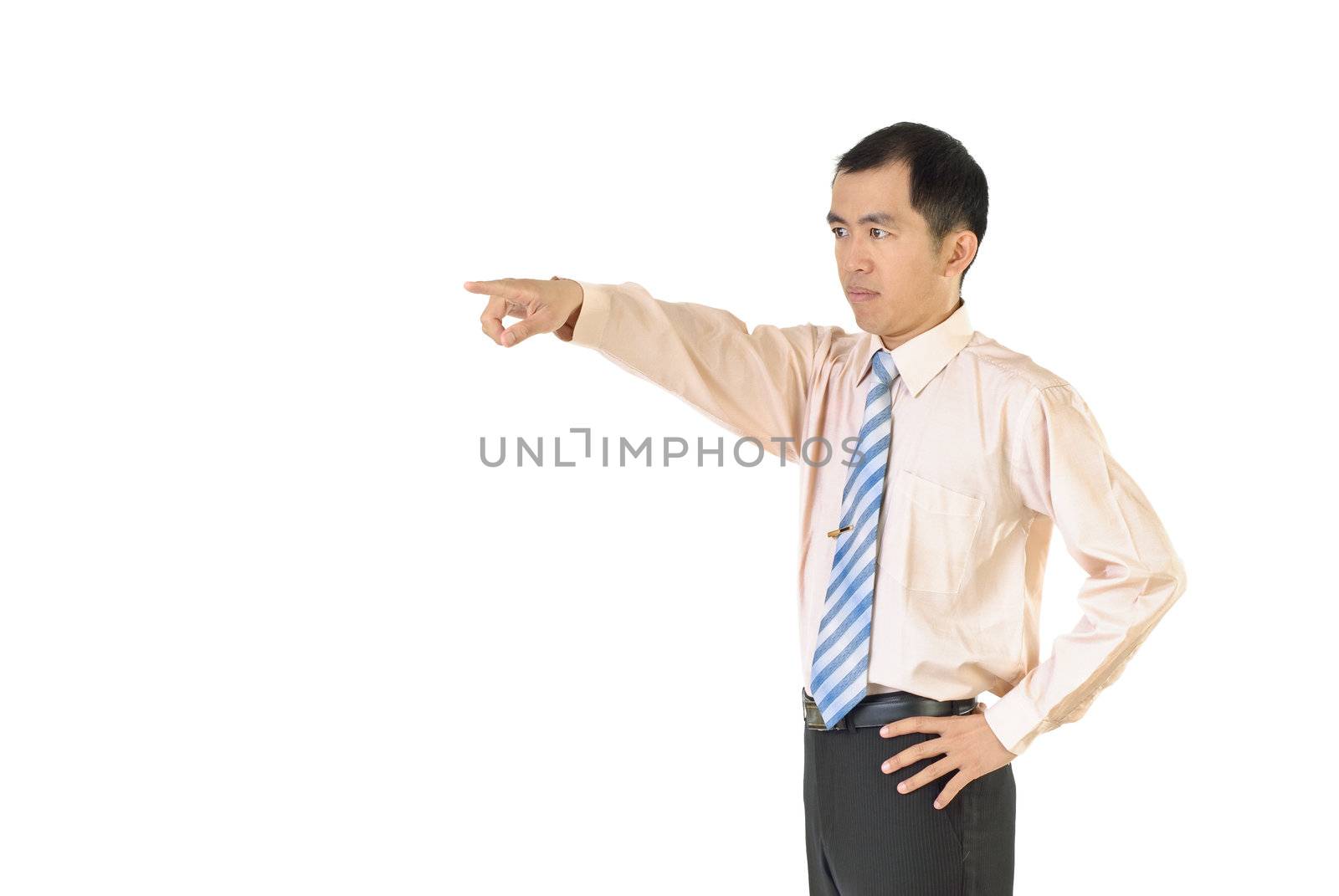 Asian businessman point somewhere and stand on white background.