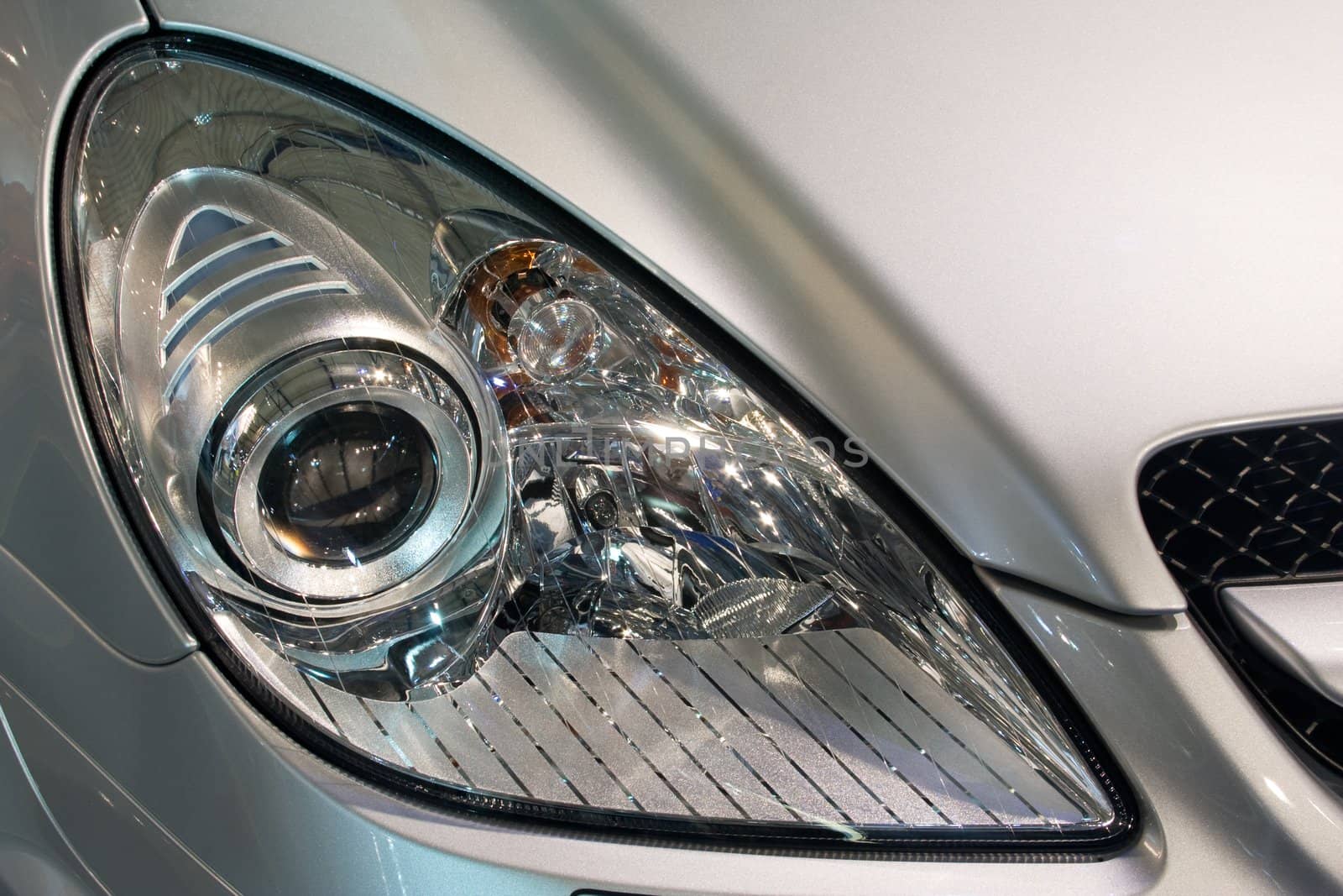 Close-up of a new modern car head lamp
