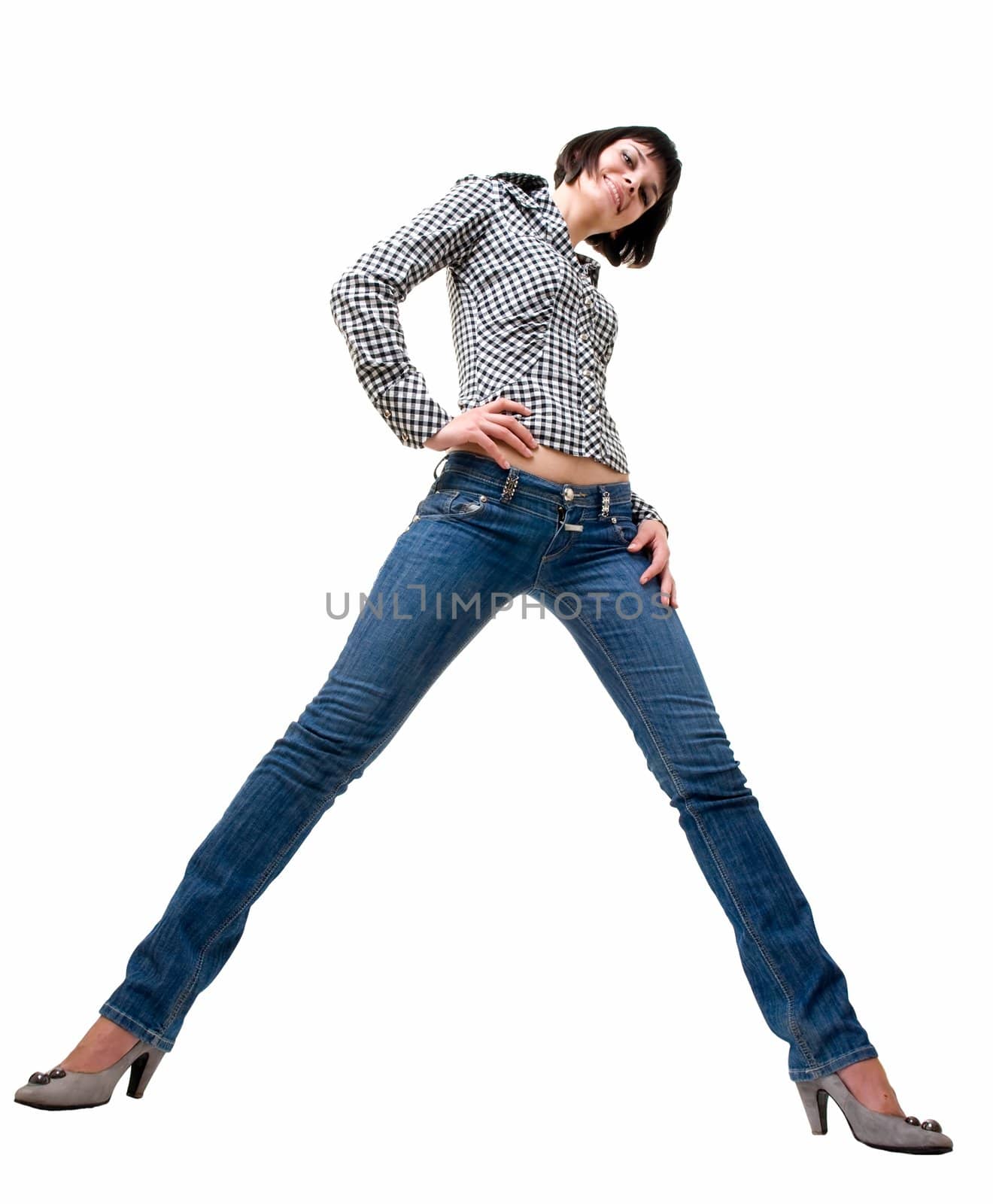 beautiful girl in jeans on a white background