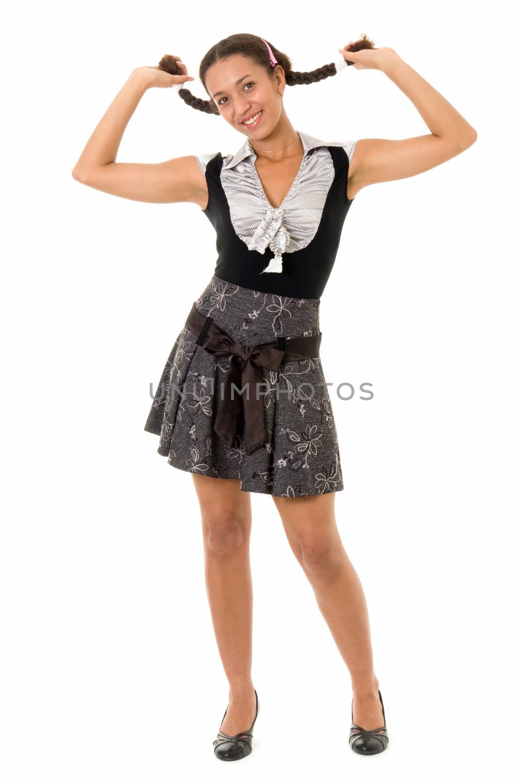 young woman with pigtails in short dress,  isolated on white.