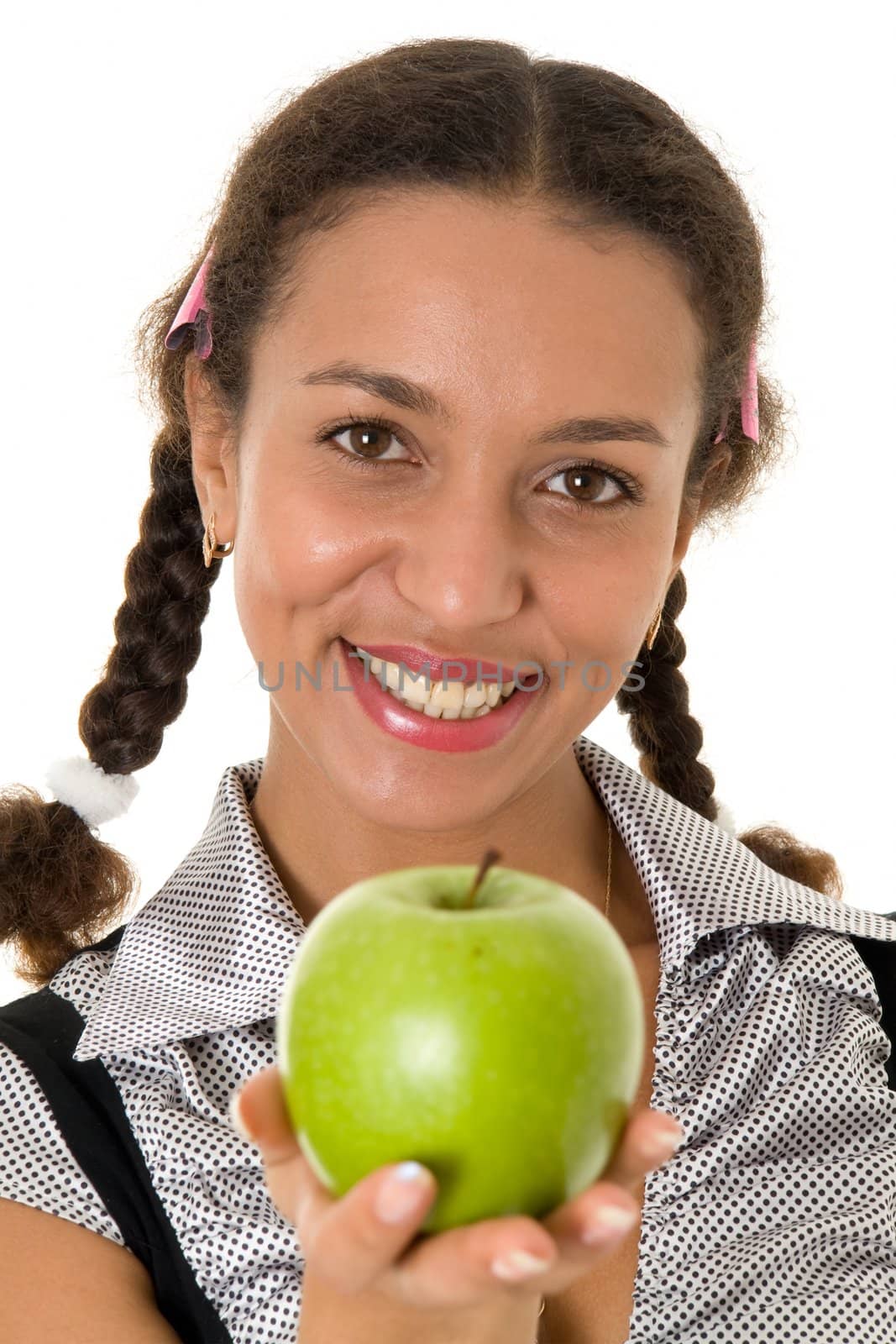 smiling girl with green apple on a white background