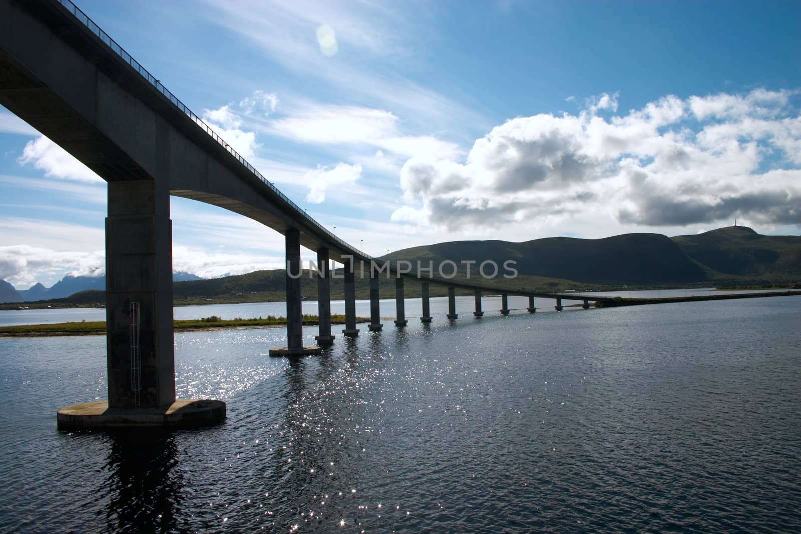 bent bridge over fiord in north norway