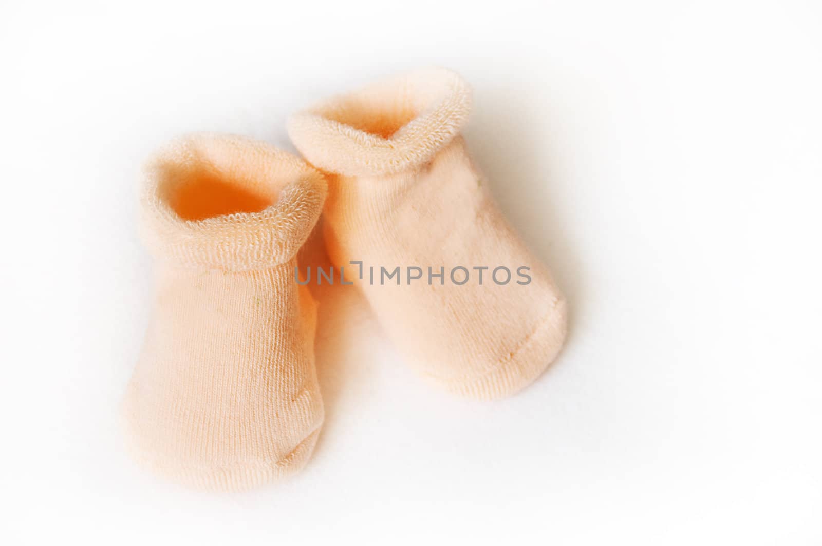 Baby pink socks over white