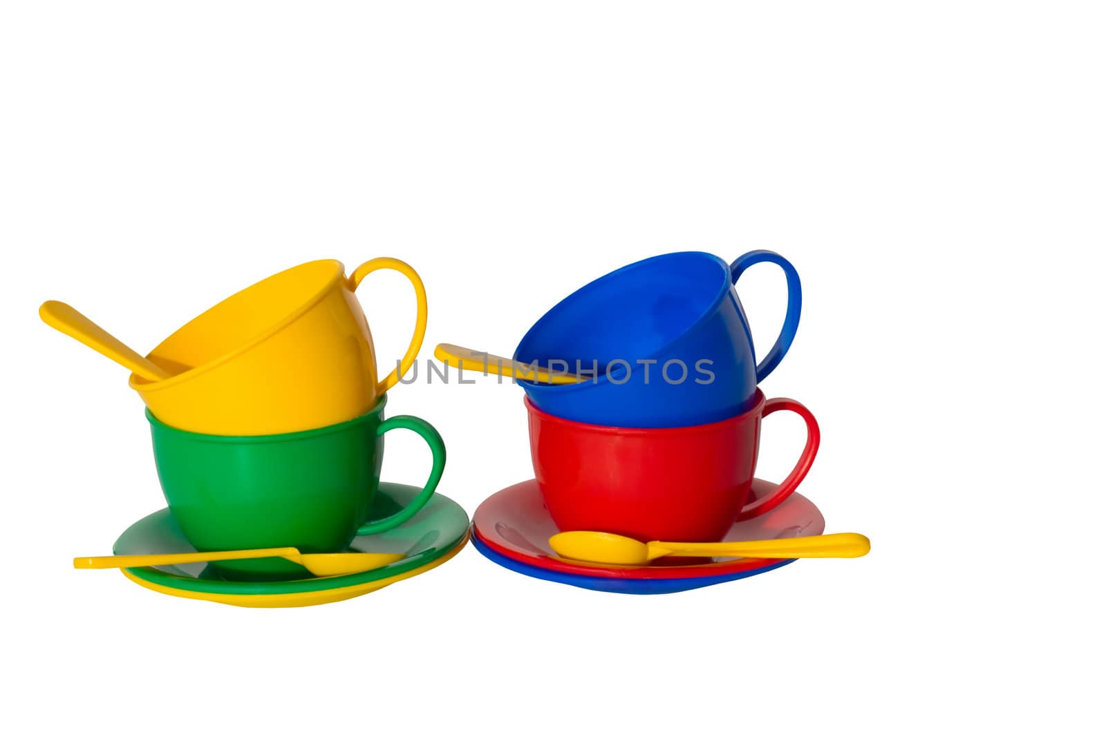 Children's toy dishes, isolated on a white background.