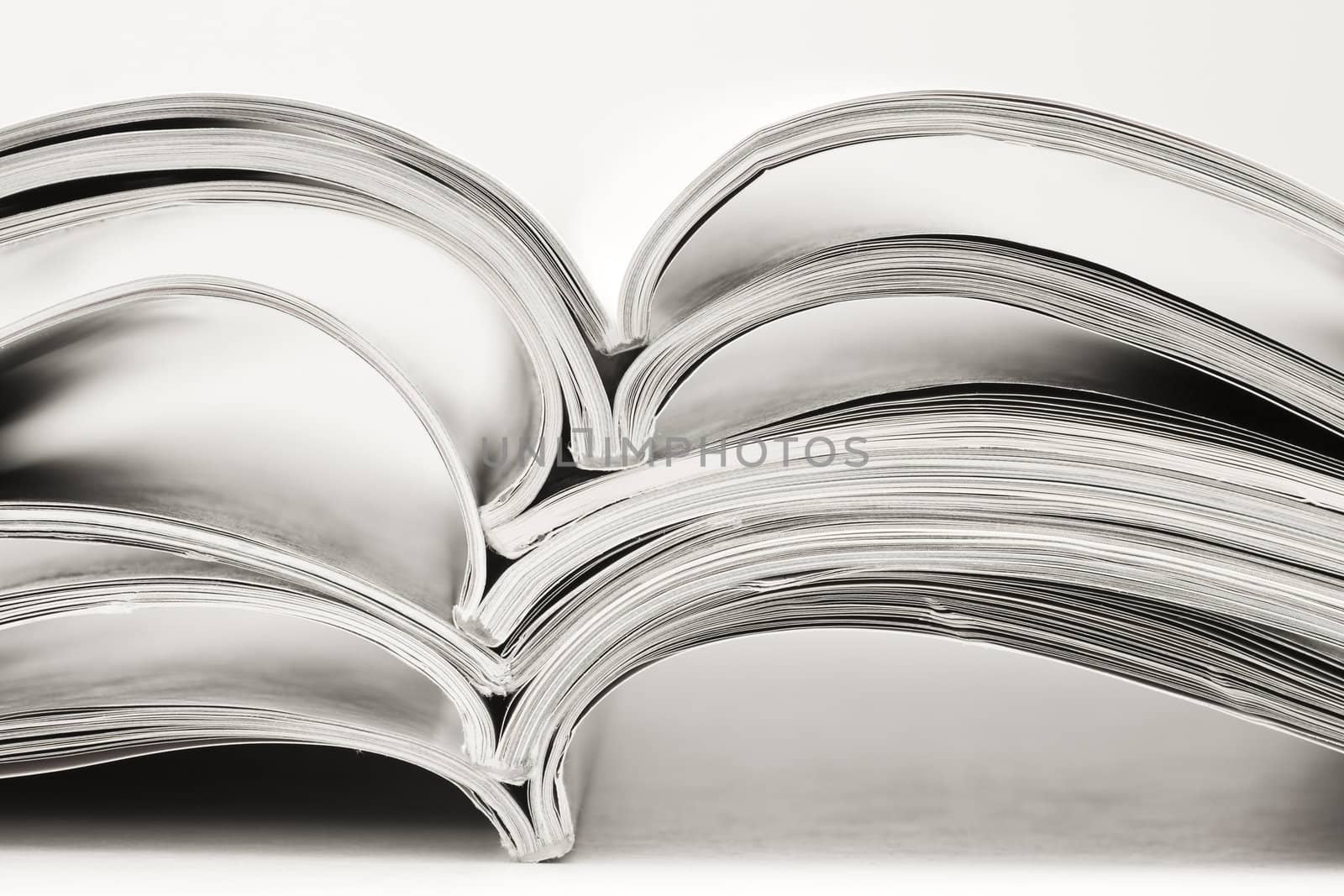 stack of magazines on white background