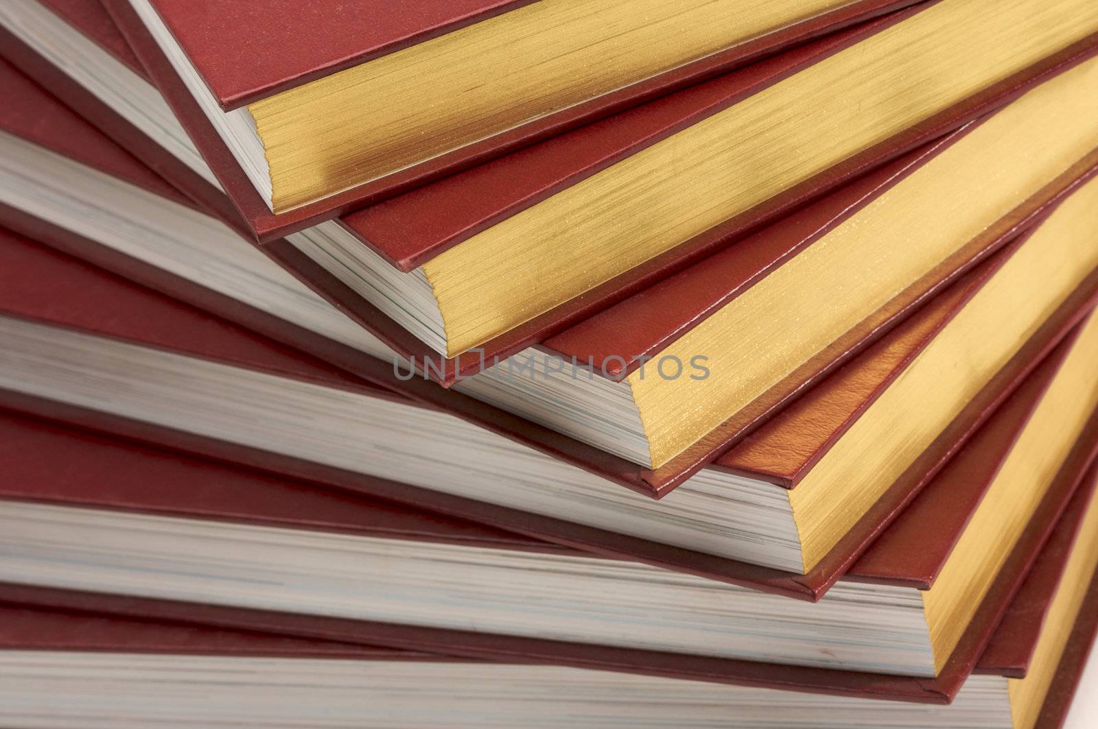 Burgundy Covered Stack of Books Close Up.
