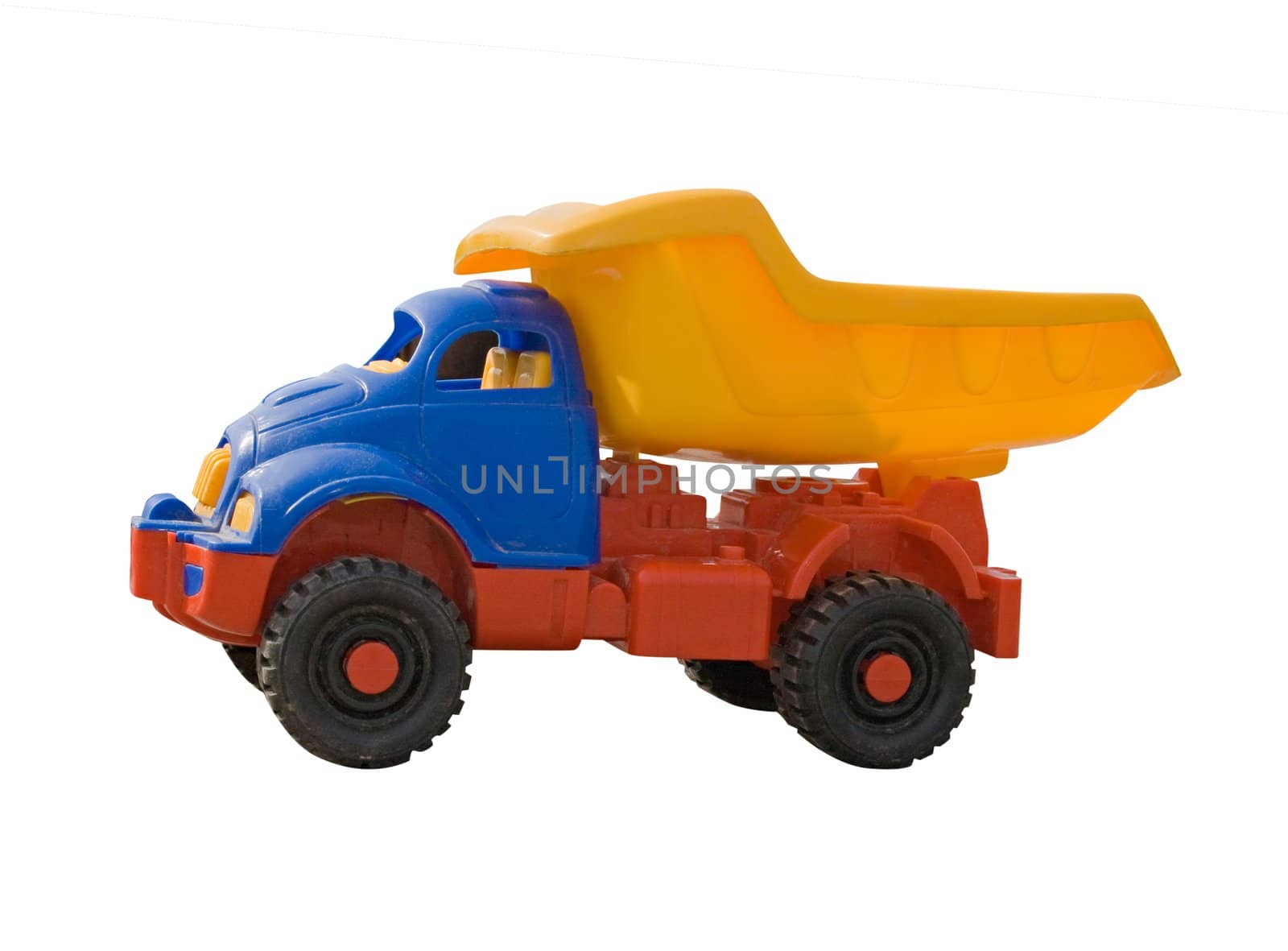 A toy truck, shot from floor level