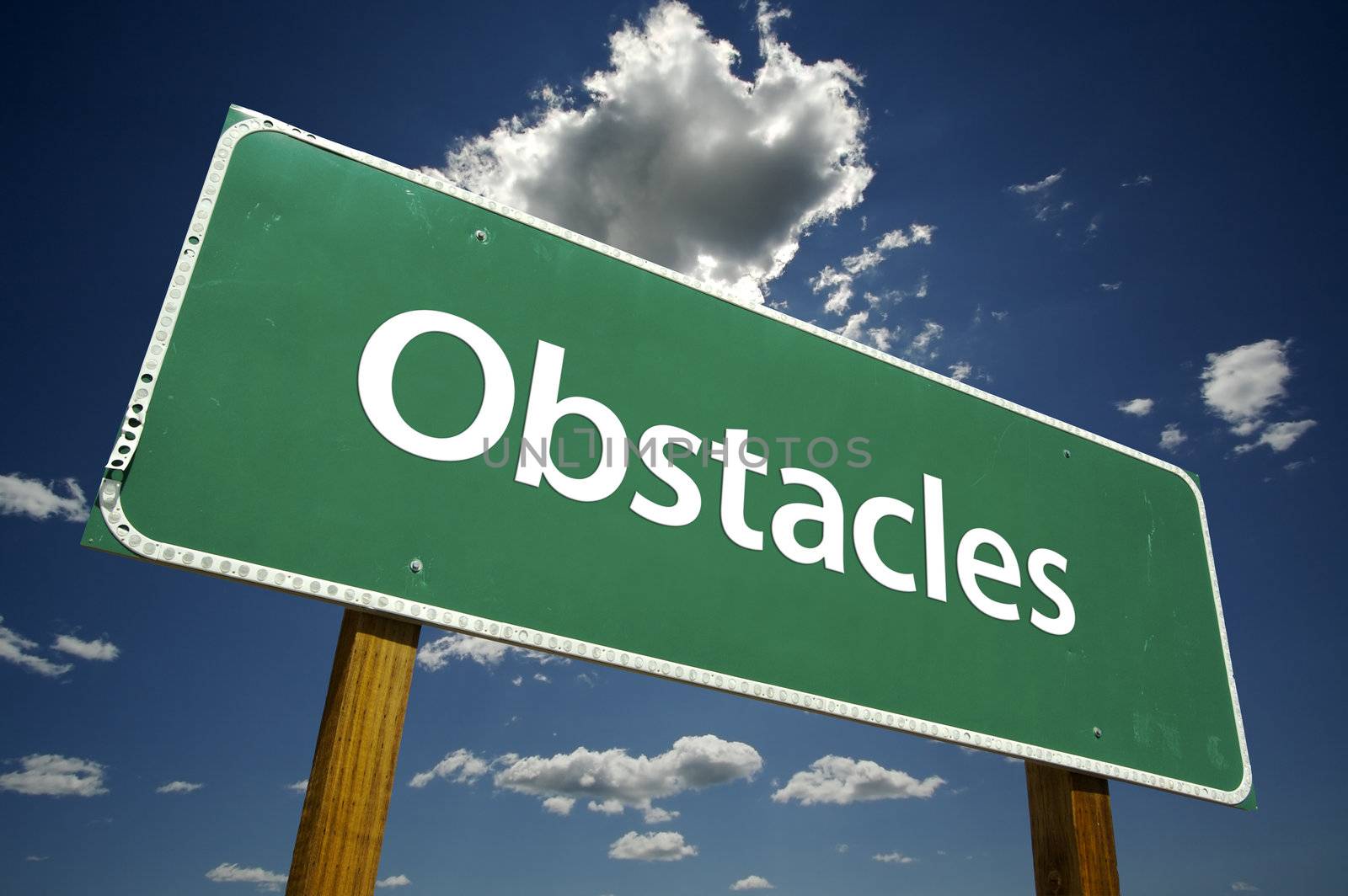 Obstacles Road Sign with dramatic clouds and sky.
