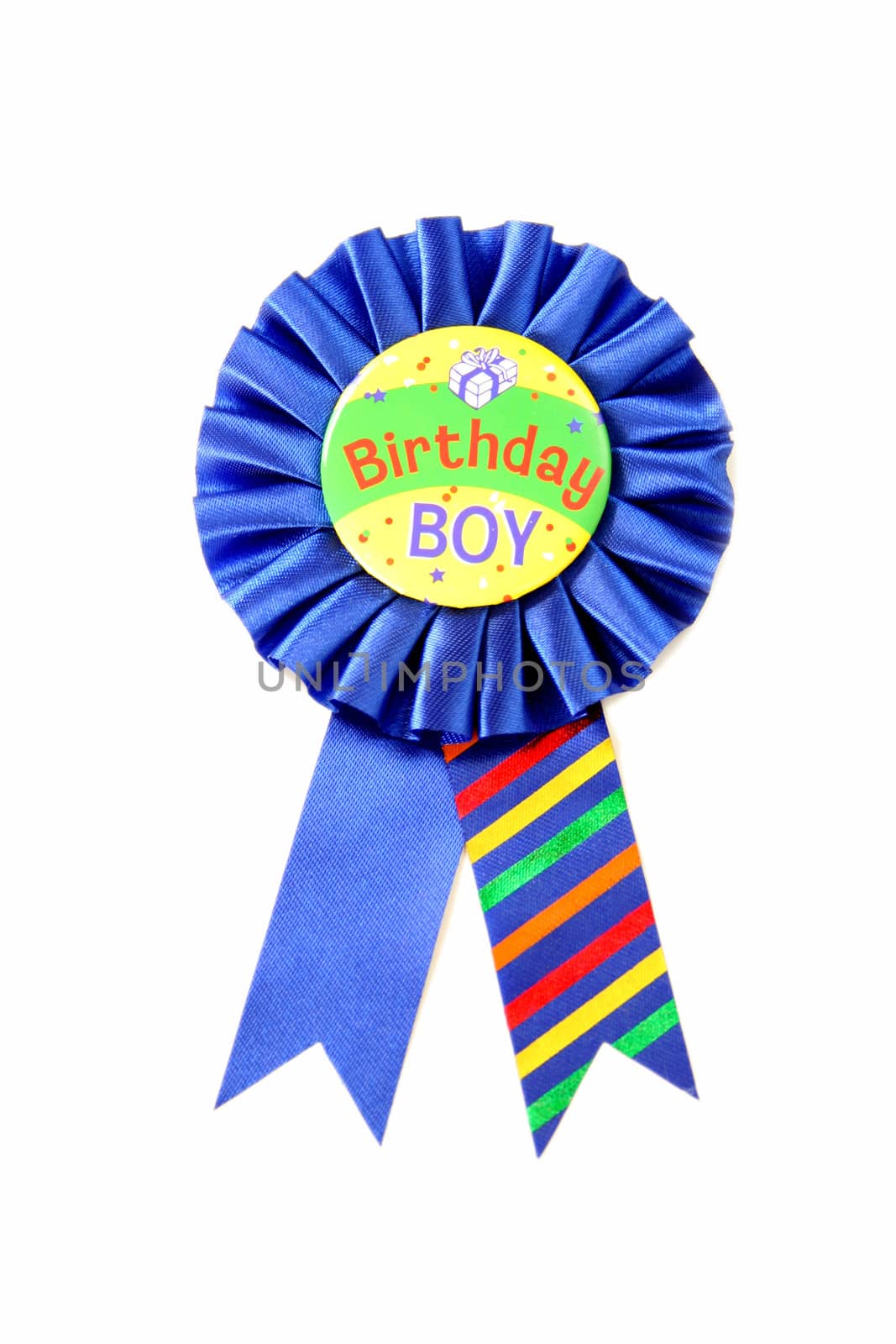 A blue ribbon for the Birthday Boy isolated on a white background.