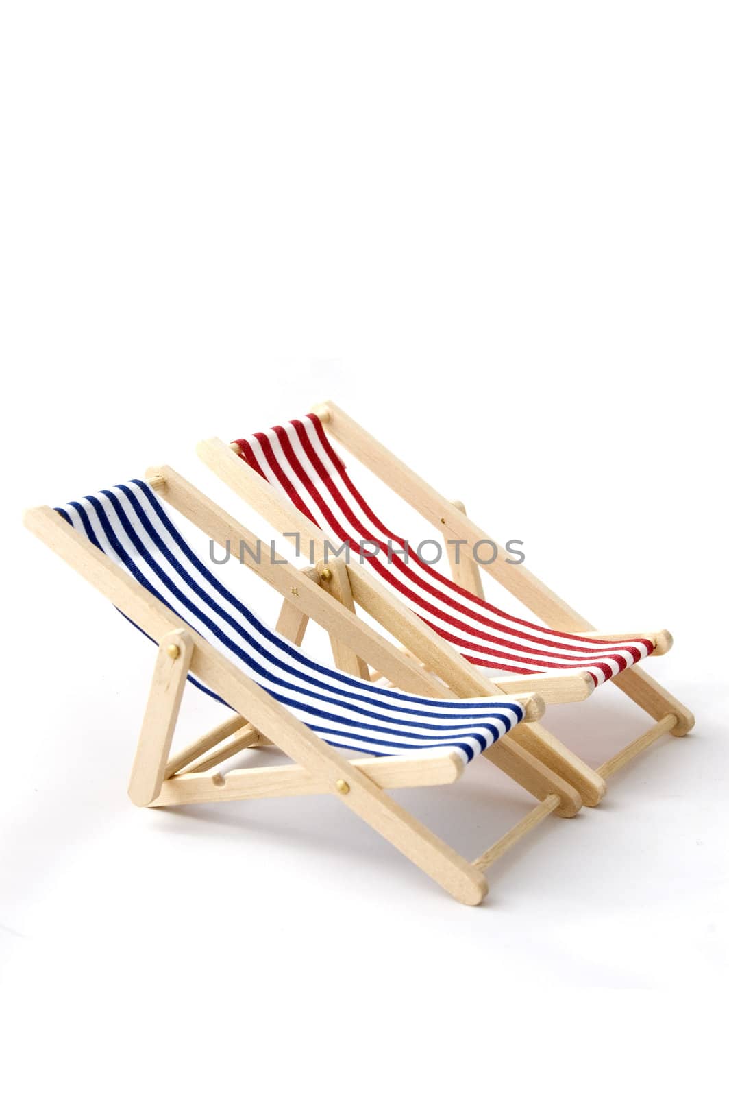 beach chairs isolated on a white background by ladyminnie