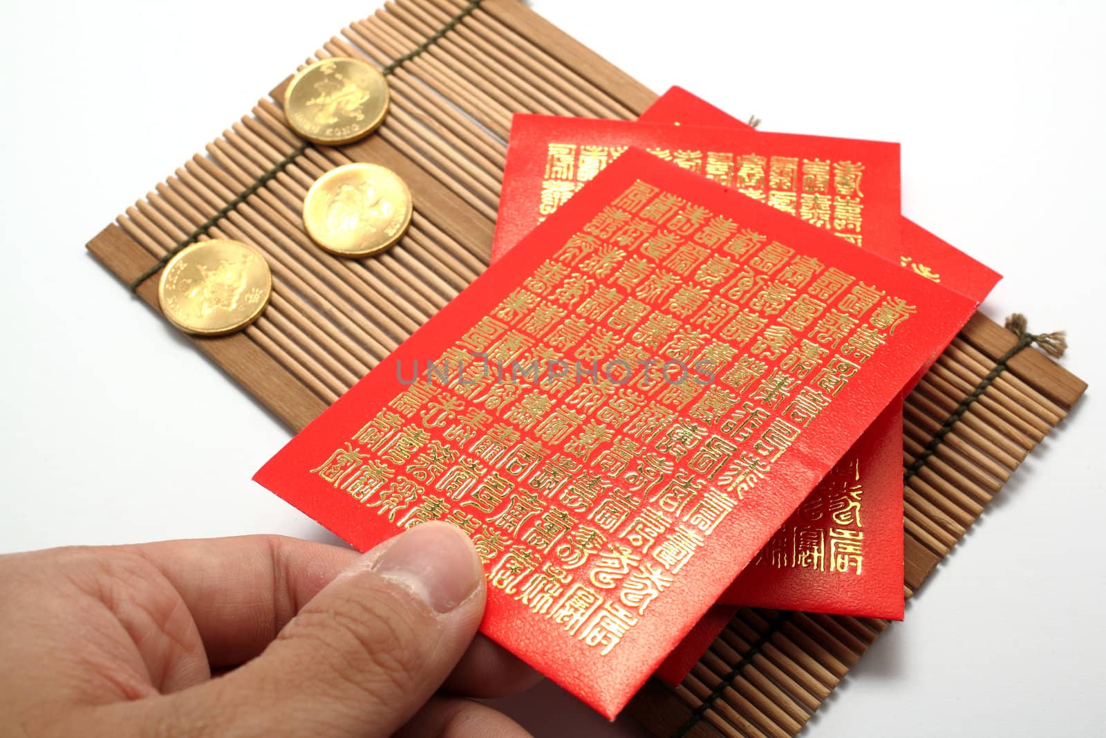 red envelopes and coins for Chinese New Year by leungchopan