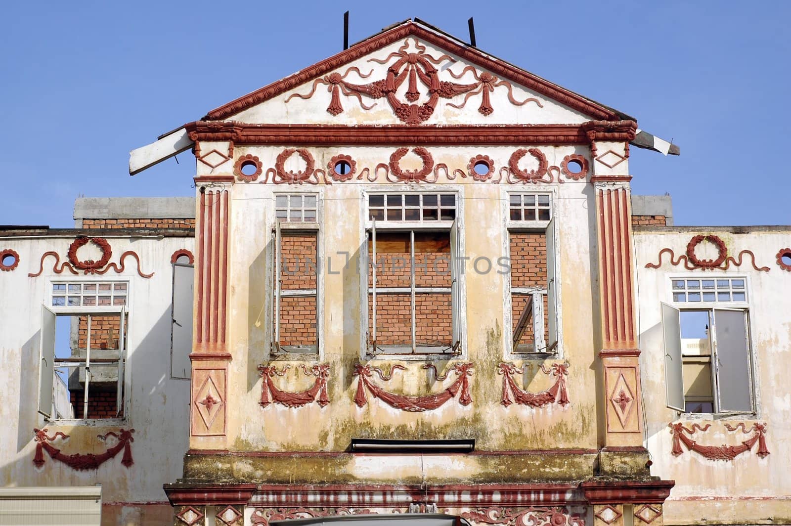 A deserted demolished old colonial heritage building