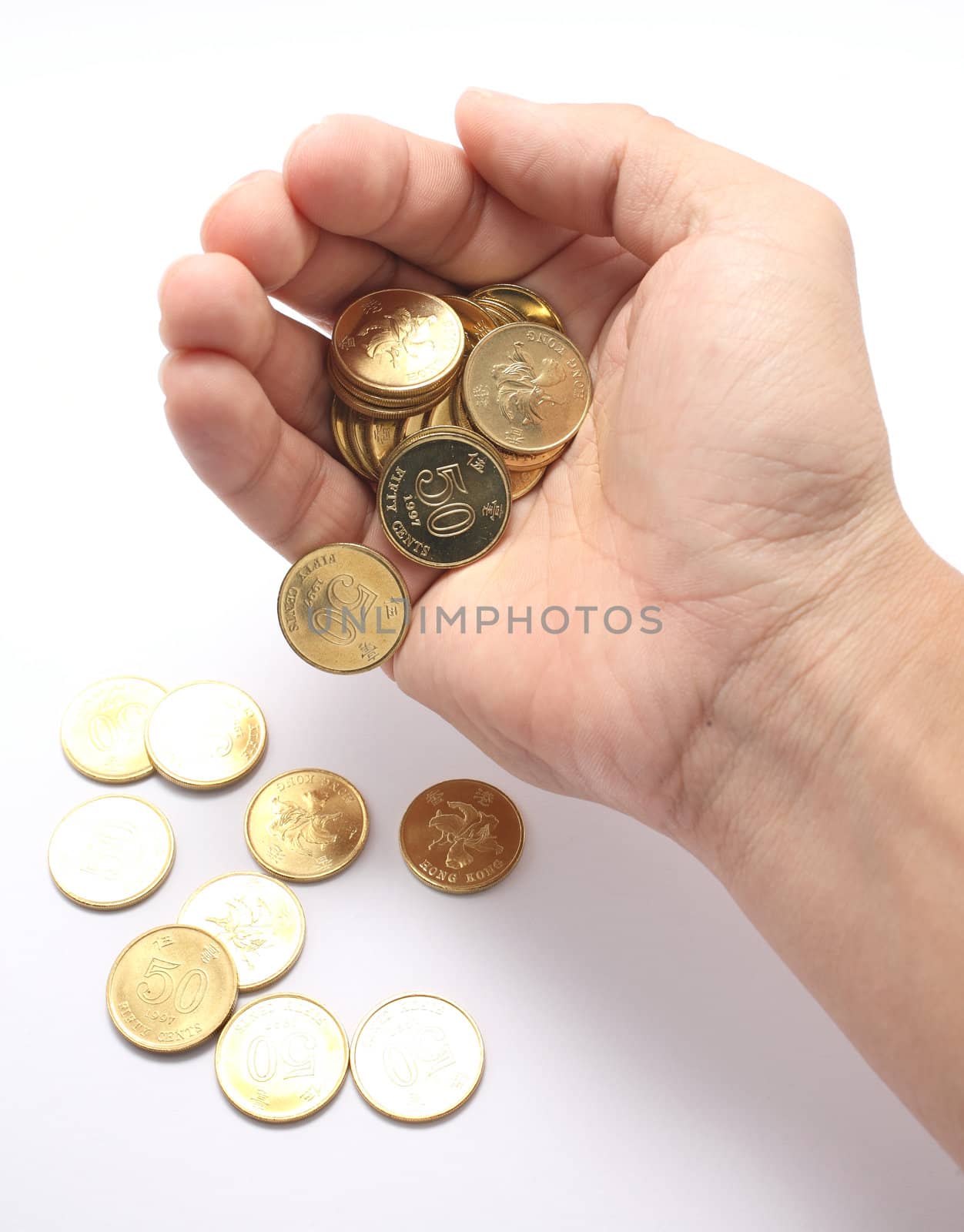 A hand dropping coins