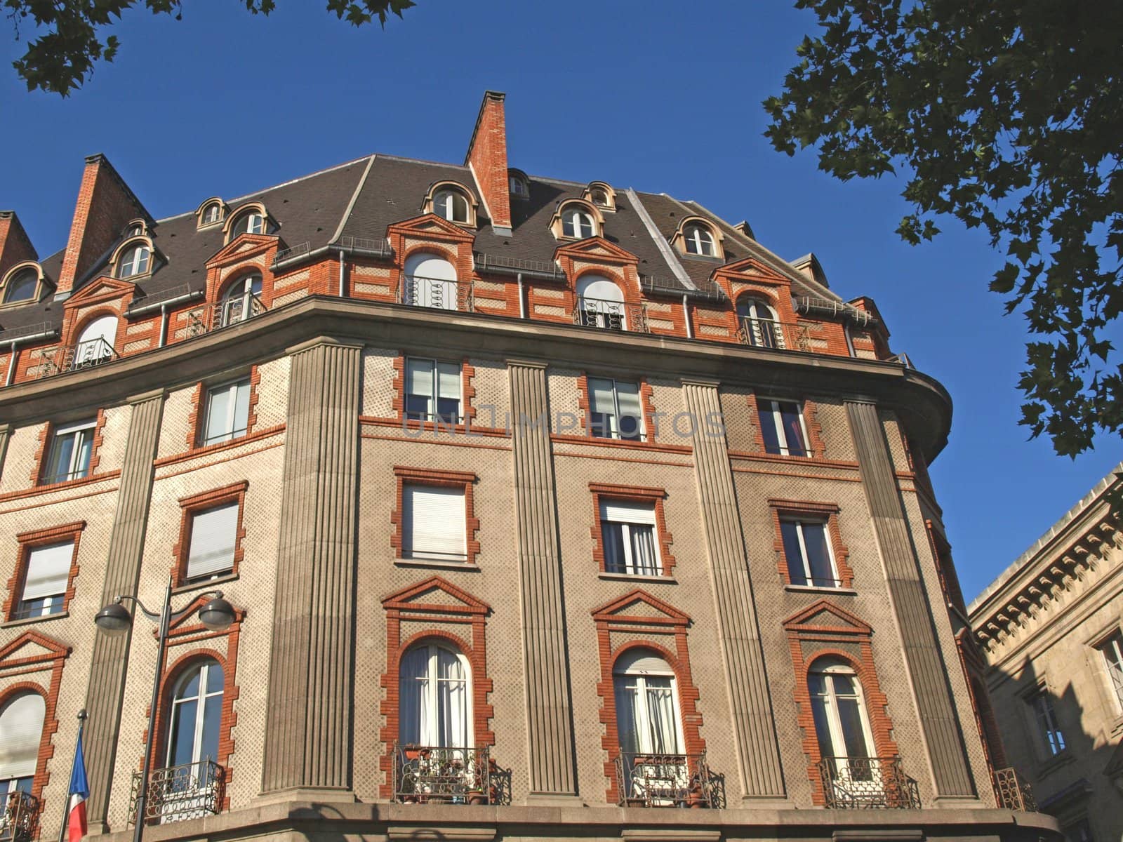 Ancient parisian building on the quays of the left side of the Seine river