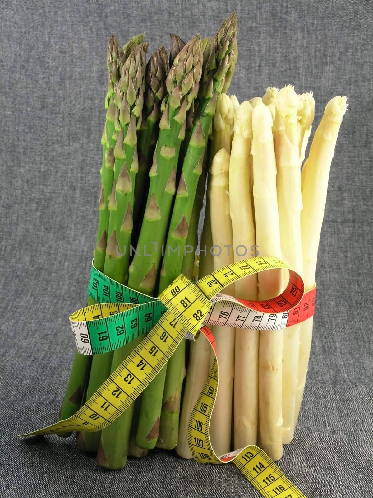  bunch of asparagus isolated on dark background