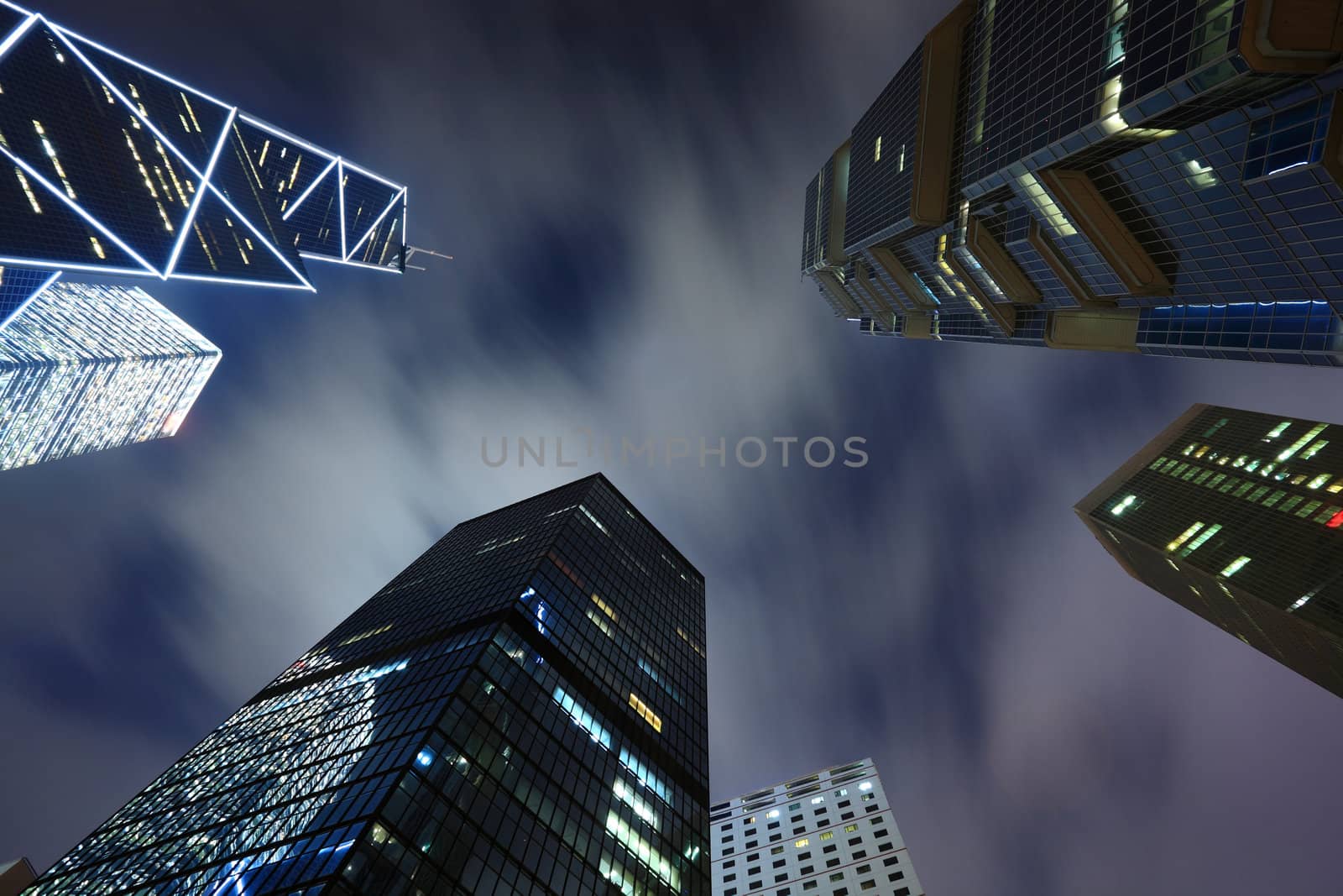 Business buildings at night by leungchopan