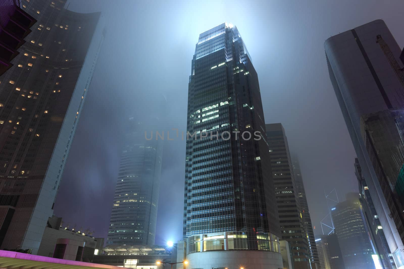 skyscraper in mist at Hong Kong by leungchopan