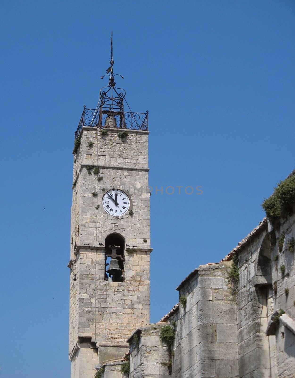 Bell tower of the provence church of Saint-Gilles in Camargue