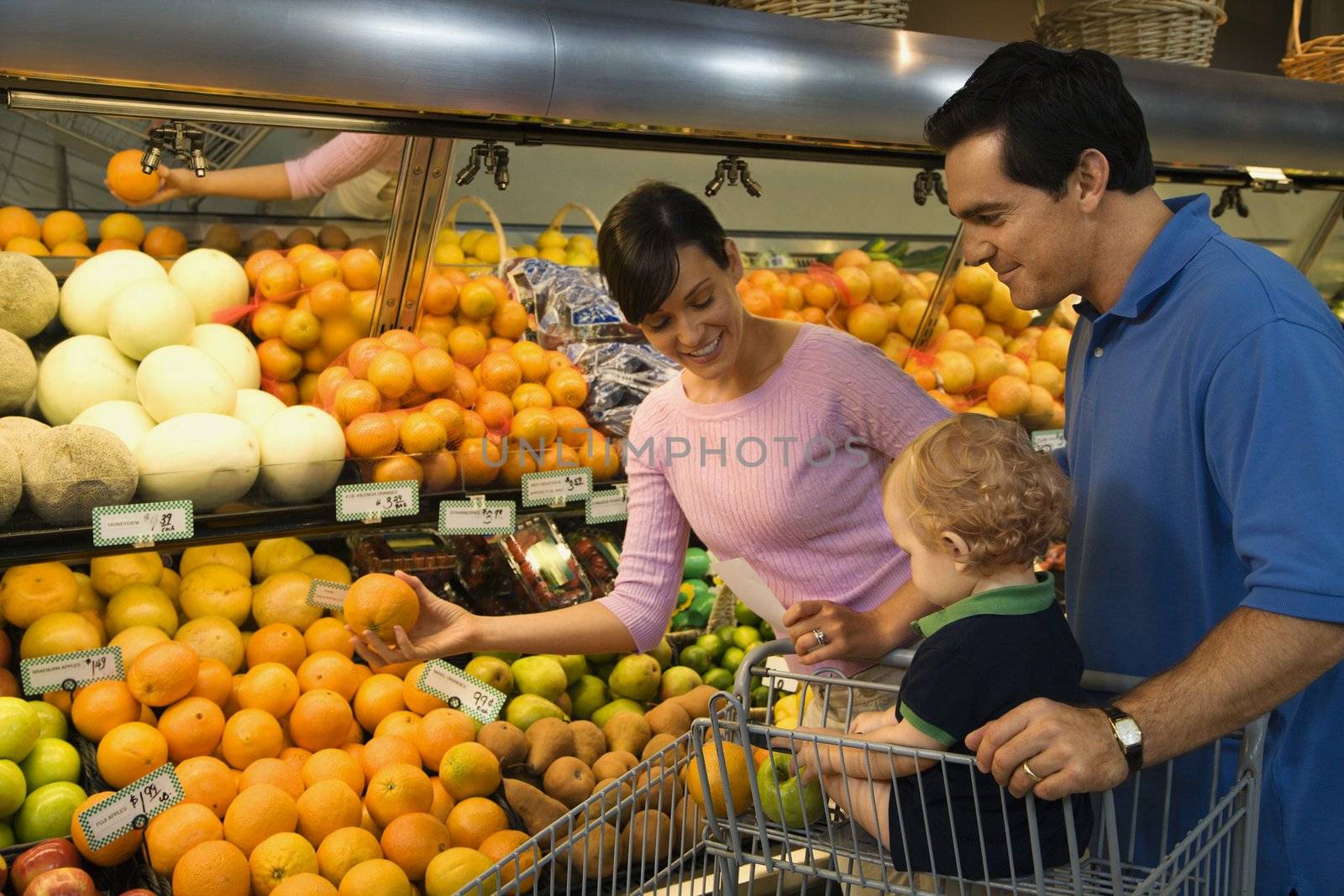 Family grocery shopping. by iofoto