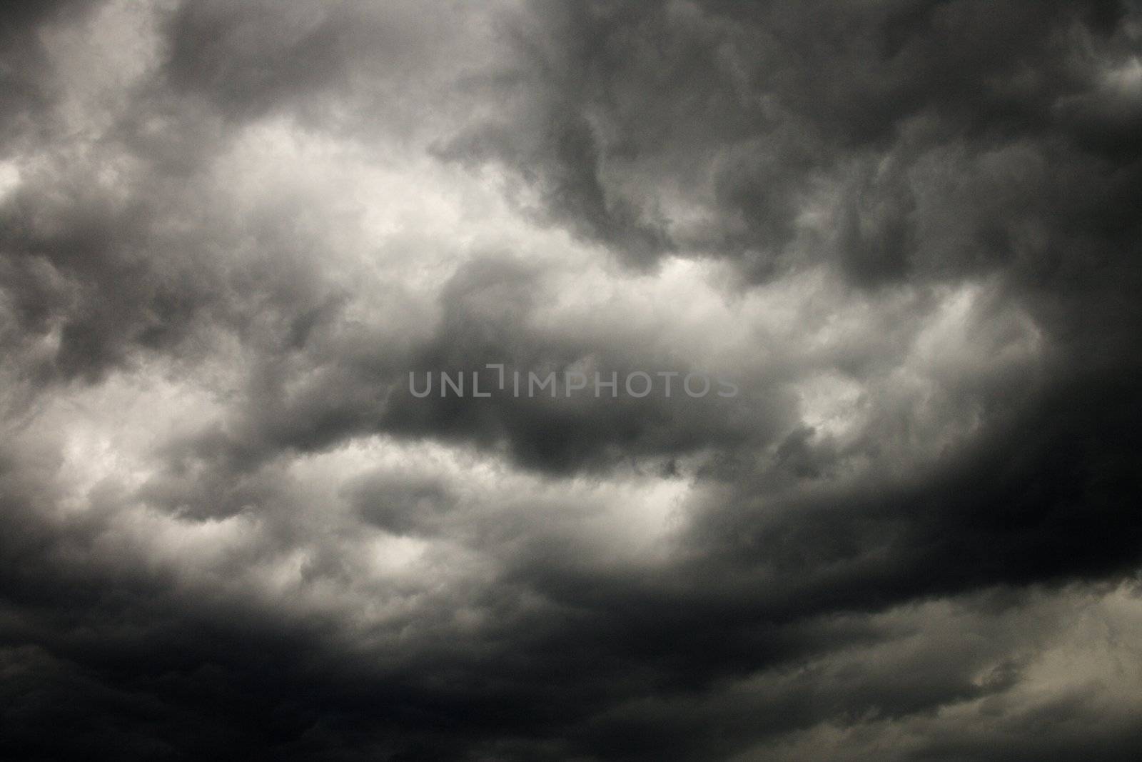 Dark storm clouds. by iofoto