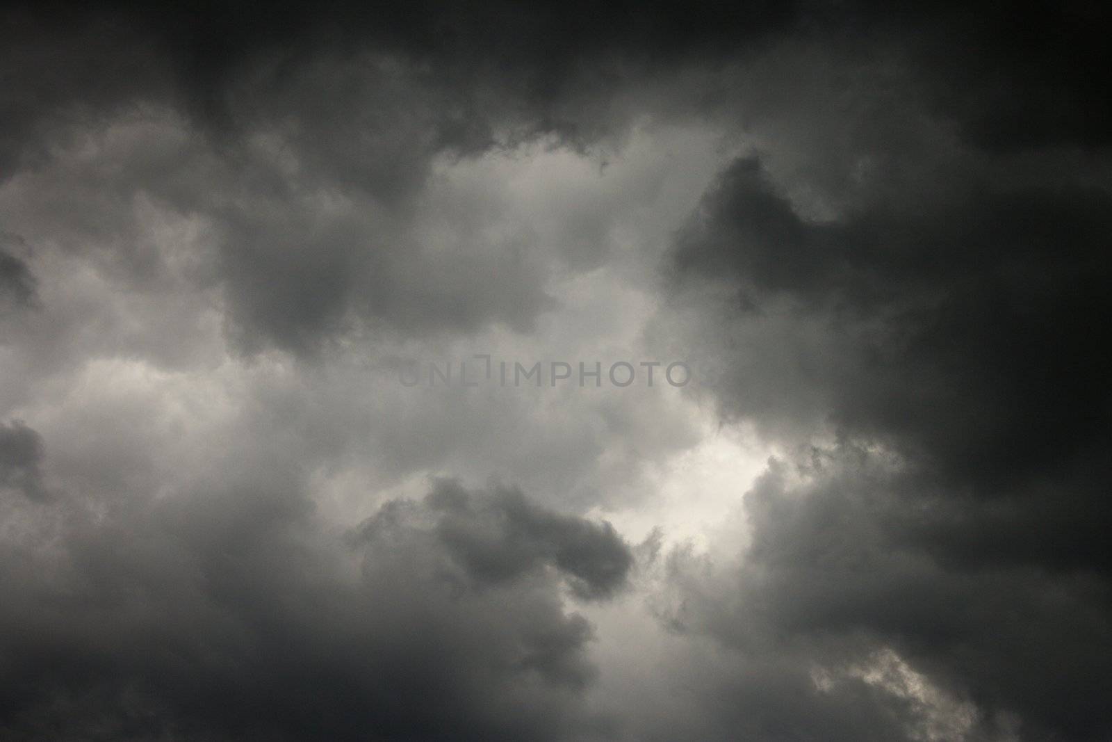 Dark storm clouds. by iofoto