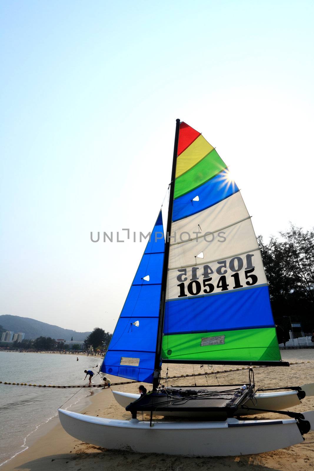Sailboat on beach by leungchopan