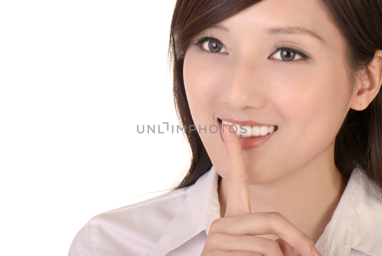 Silent sign with beautiful businesswoman on white background.