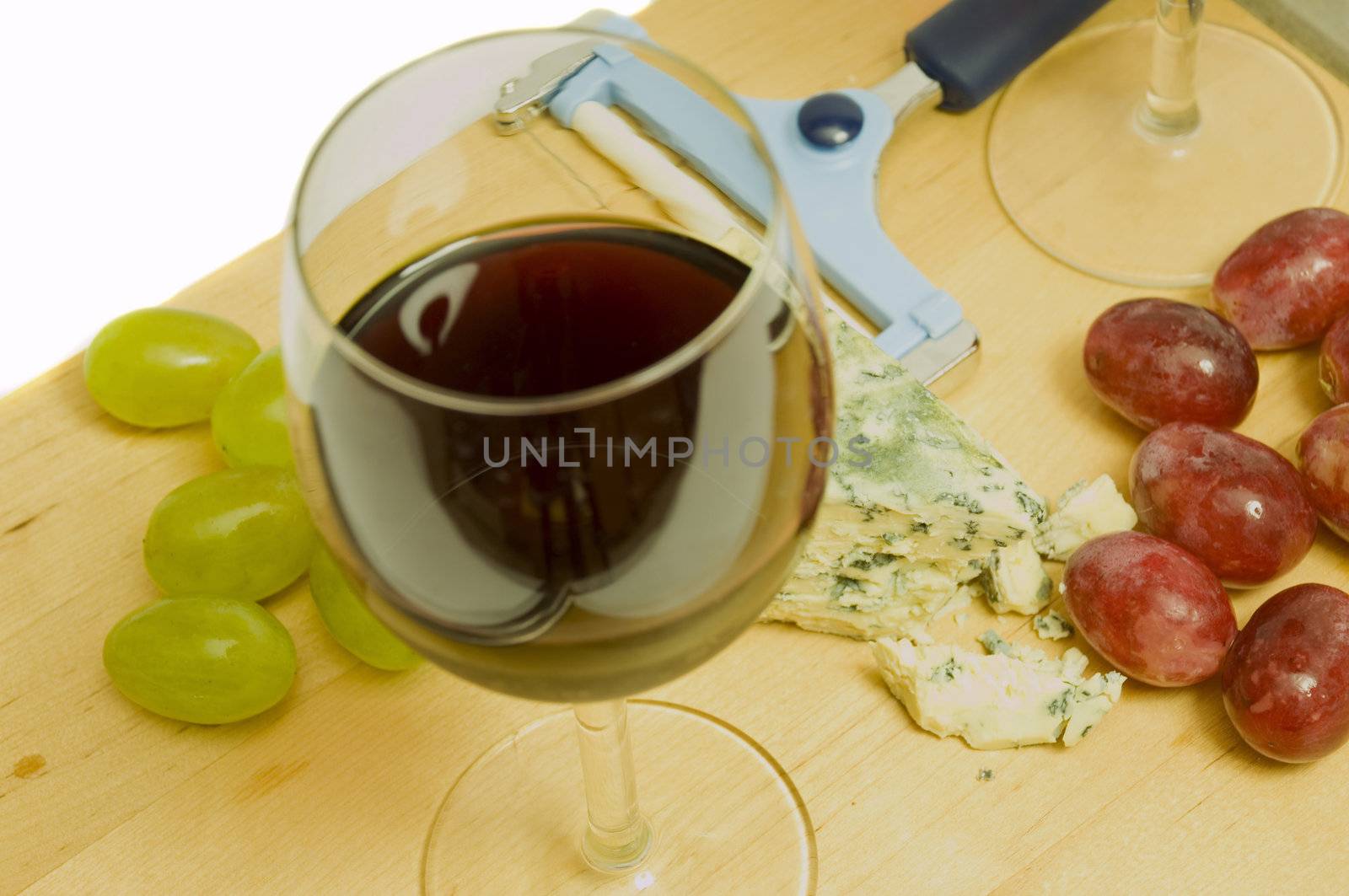 french eating delights with wine and cheese, on white background