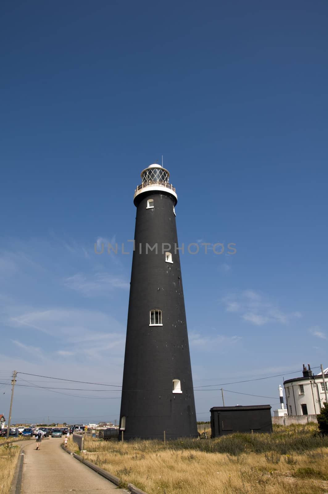 A black lighthouse at Dungeness , Kent