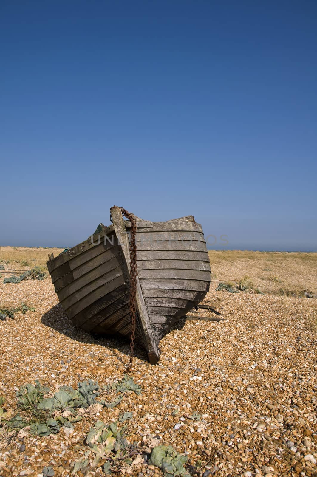 An old fishing boat on the beach at Dungeness