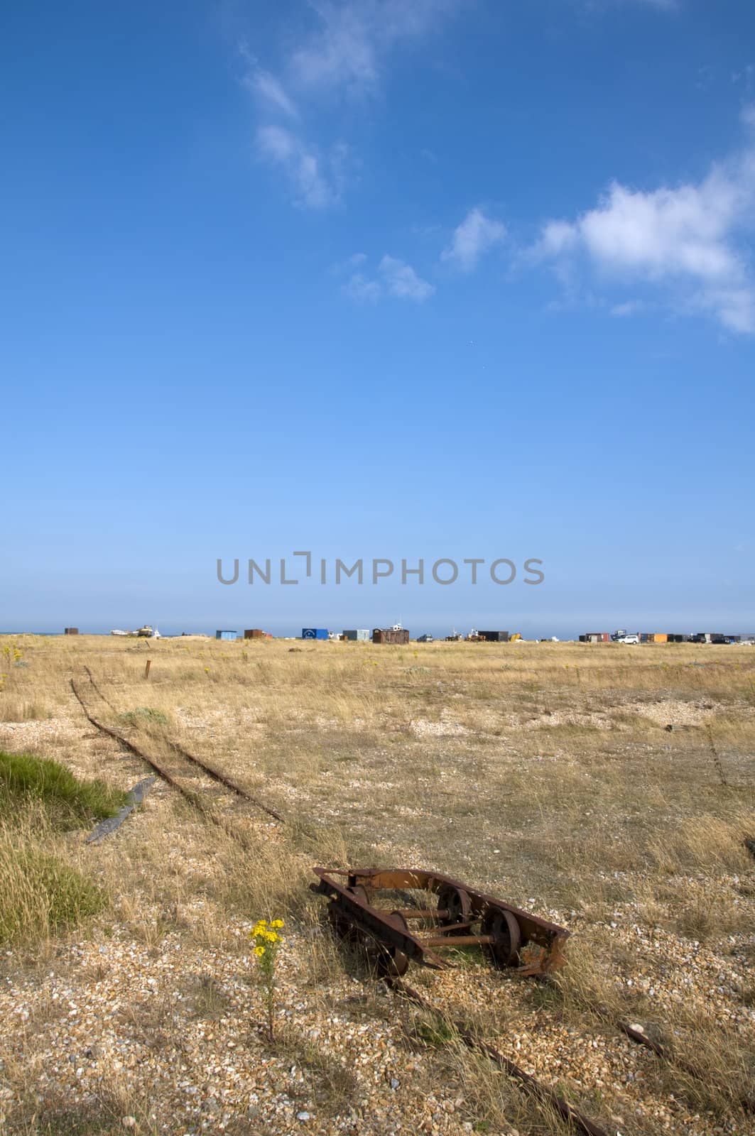 Old abandoned rail track on the beach at Dungeness