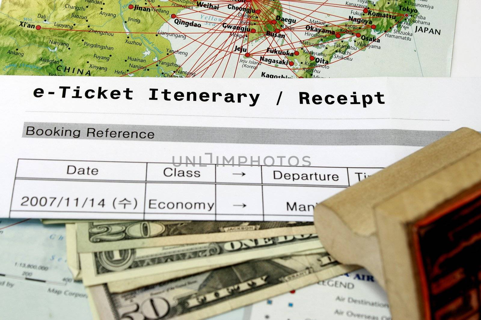 Airline ticket itinerary concept with map and dollar