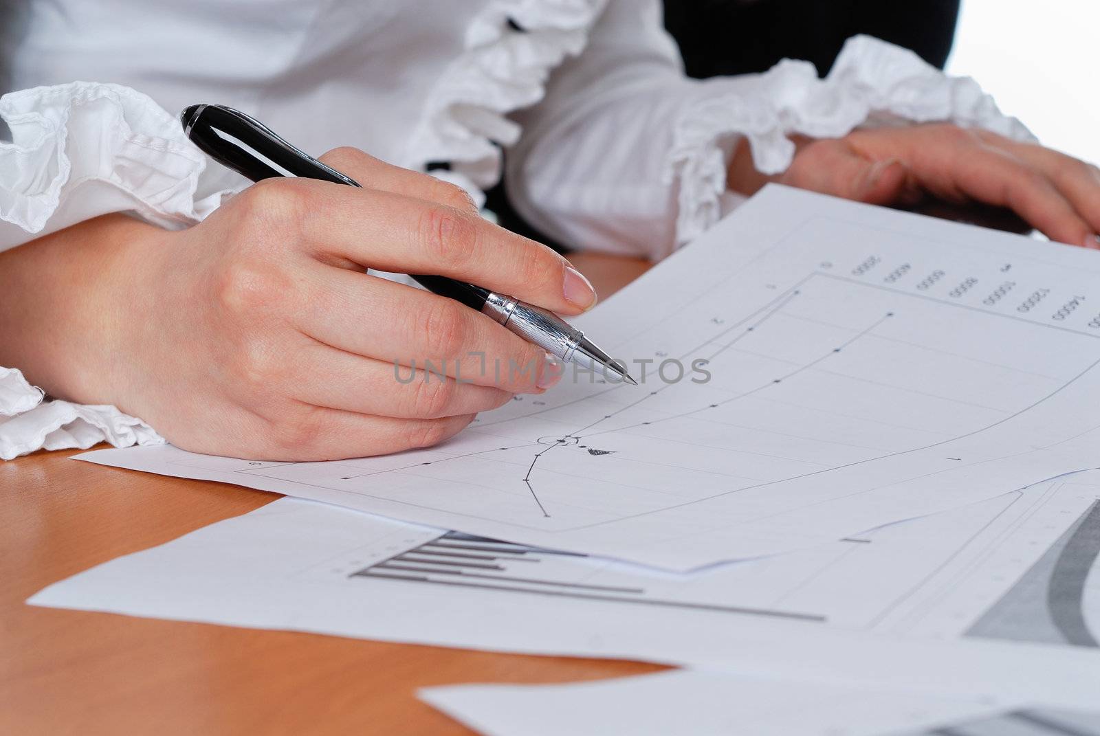 young businesswoman sign important documents