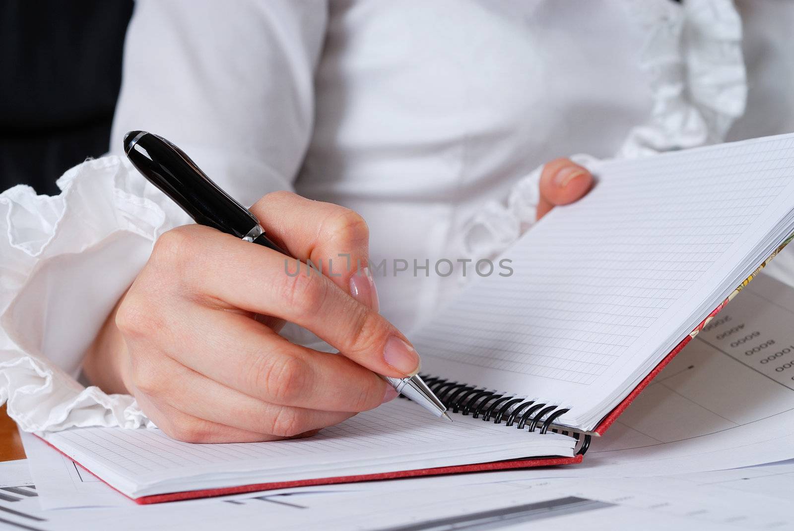 young businesswoman sign important documents